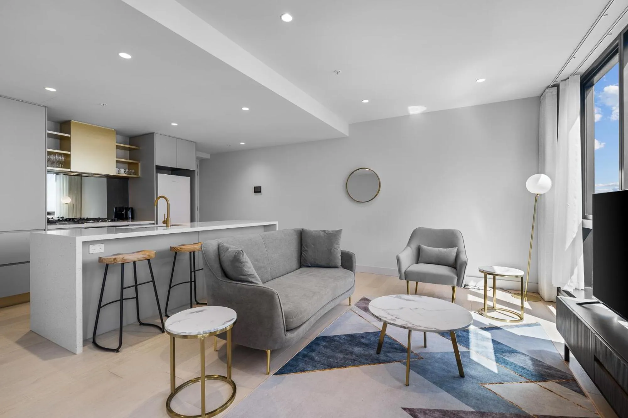 Seating area in Paragon Apartments by CLLIX