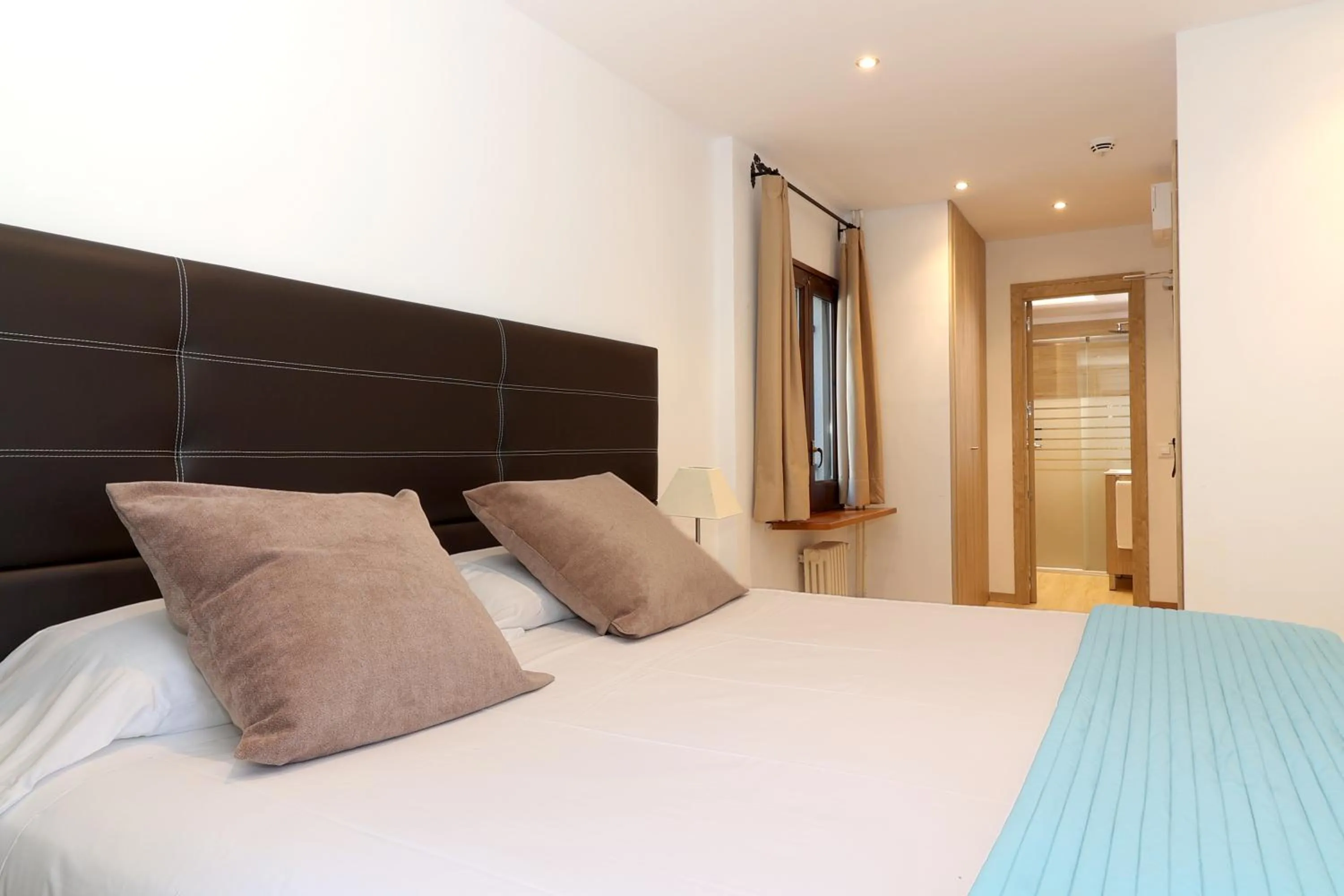 Bed in Hotel Blu Aran