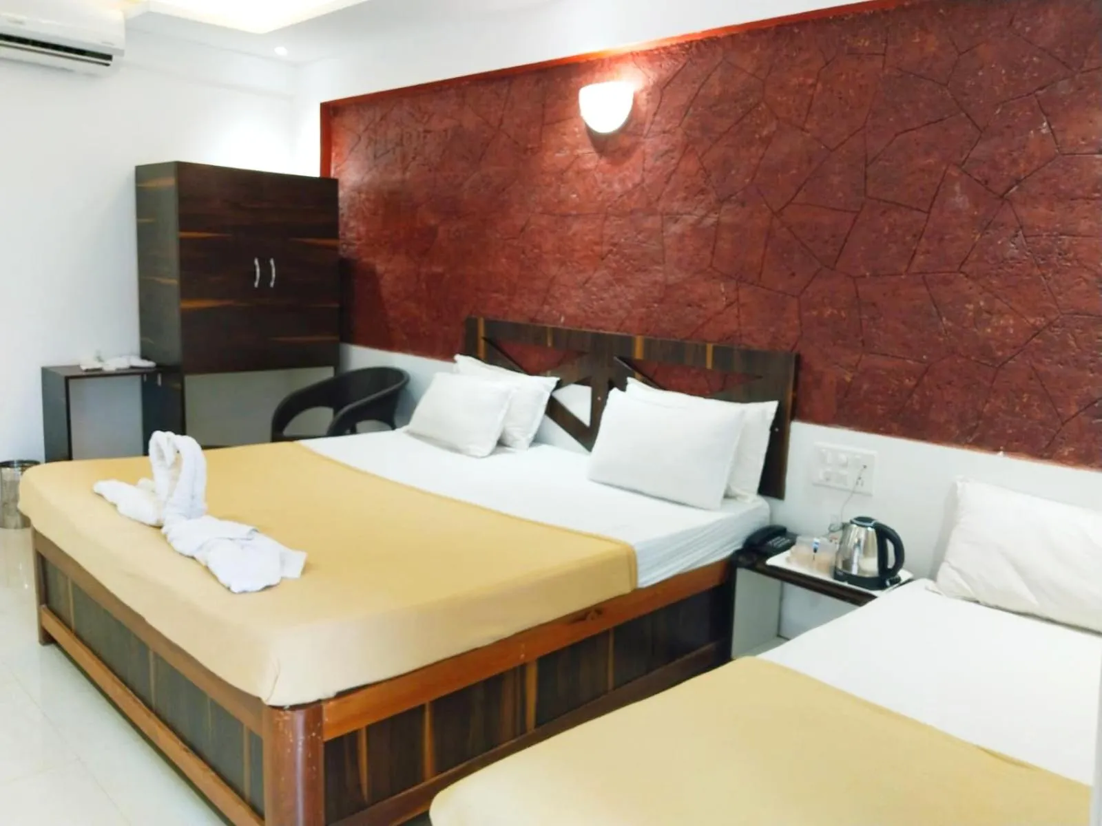 Bed in Blue Sea Beach Resort