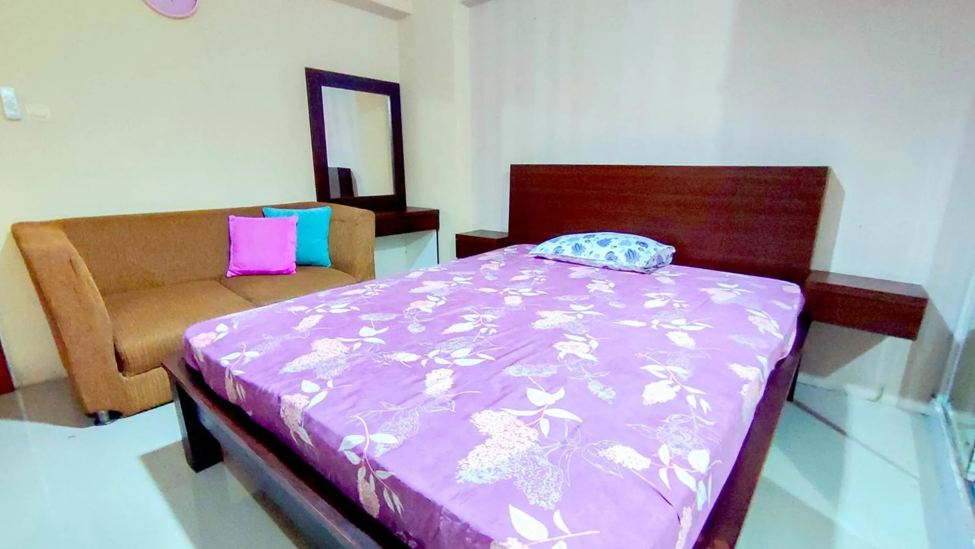 Bed in Lily Room at Apartment Cibubur Village