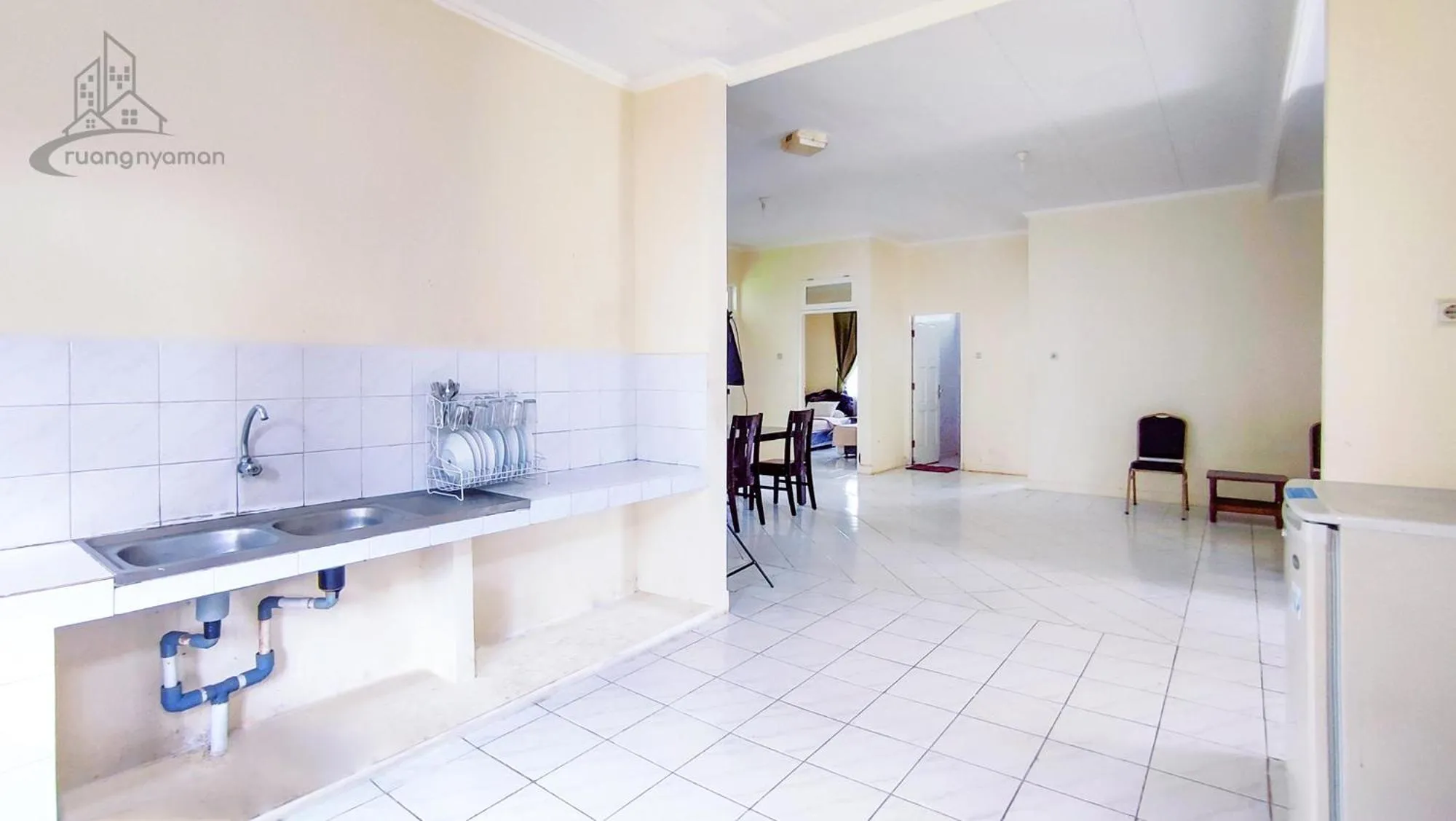 Kitchen or kitchenette in Sukanagalih Resort by Ruang Nyaman