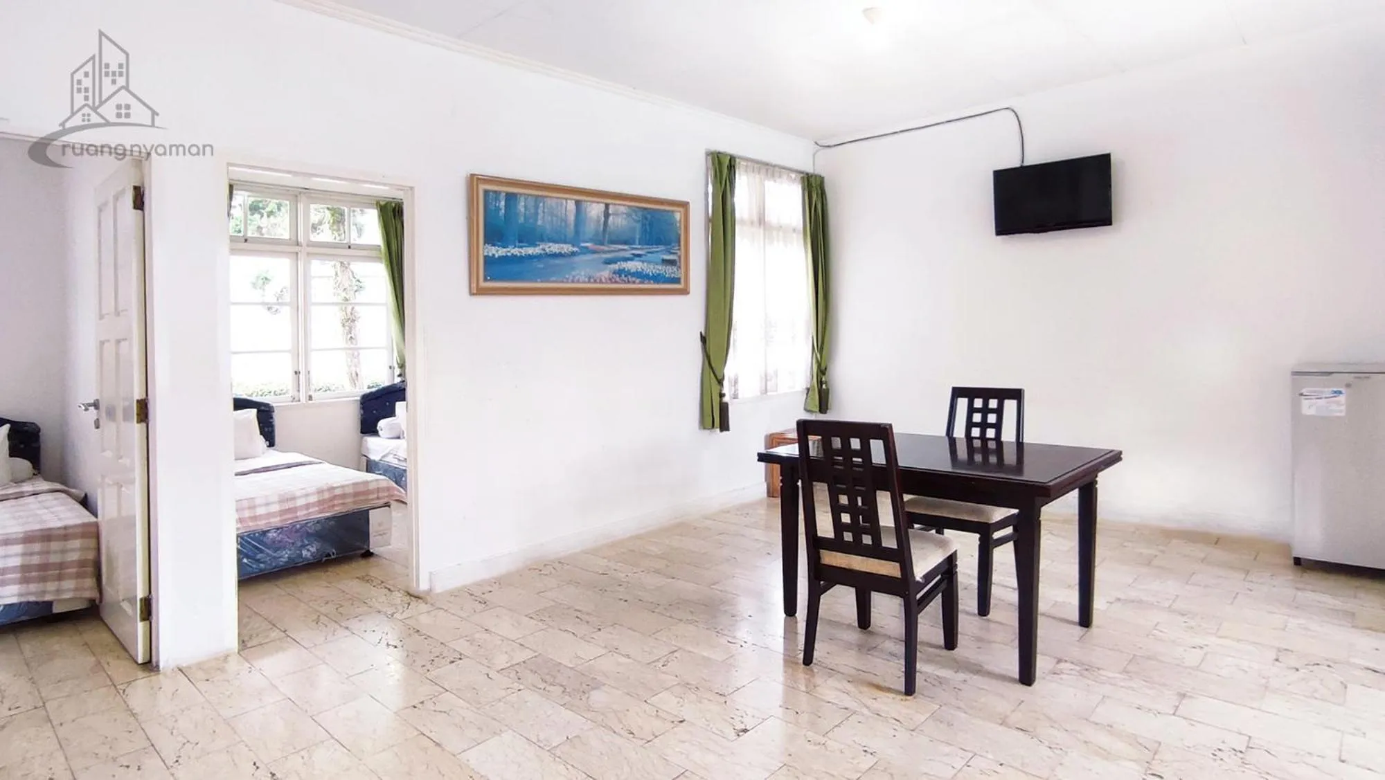 Living room, Bed in Sukanagalih Resort by Ruang Nyaman