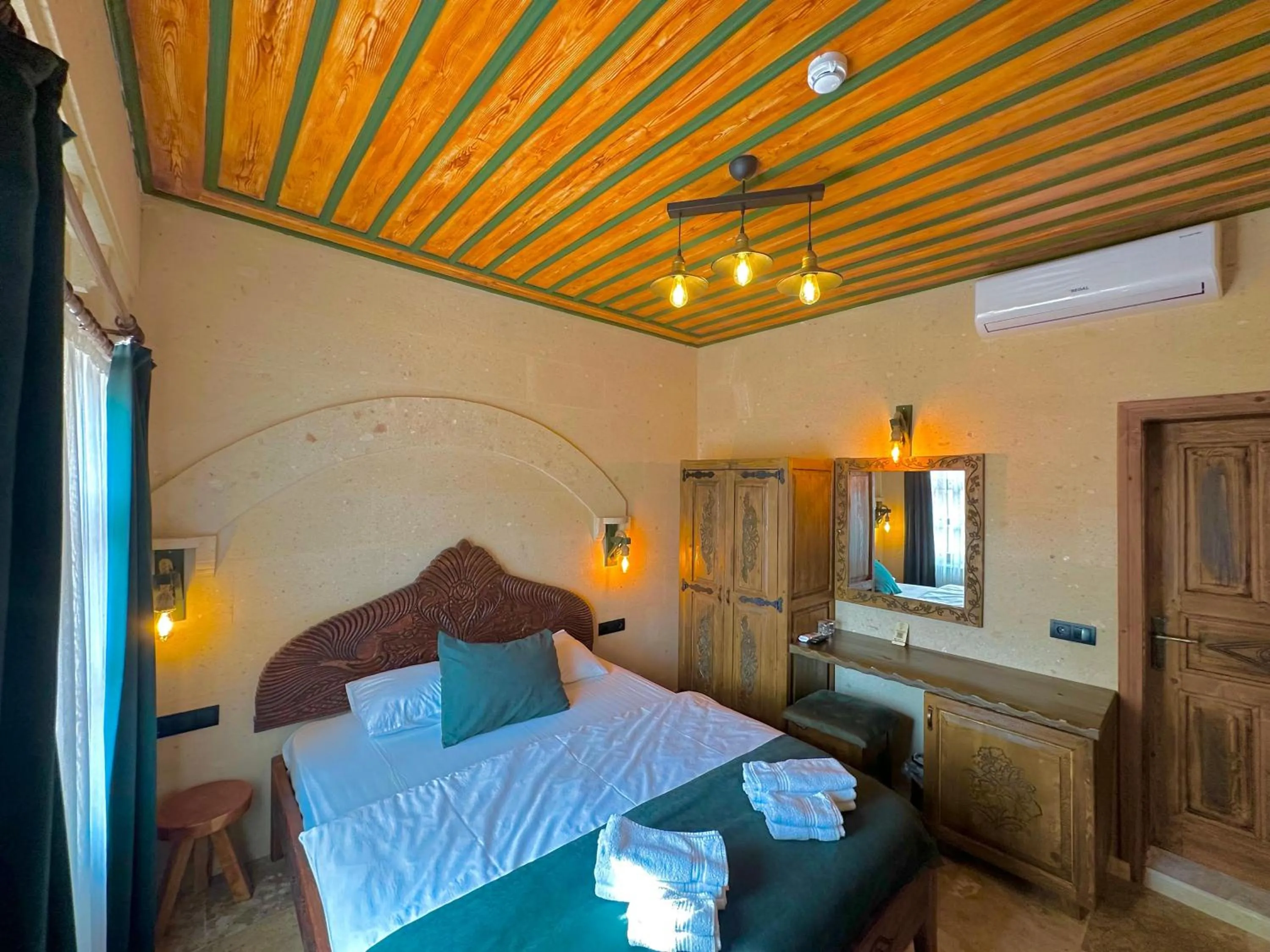 Bed in Gemosa Cappadocia Hotel