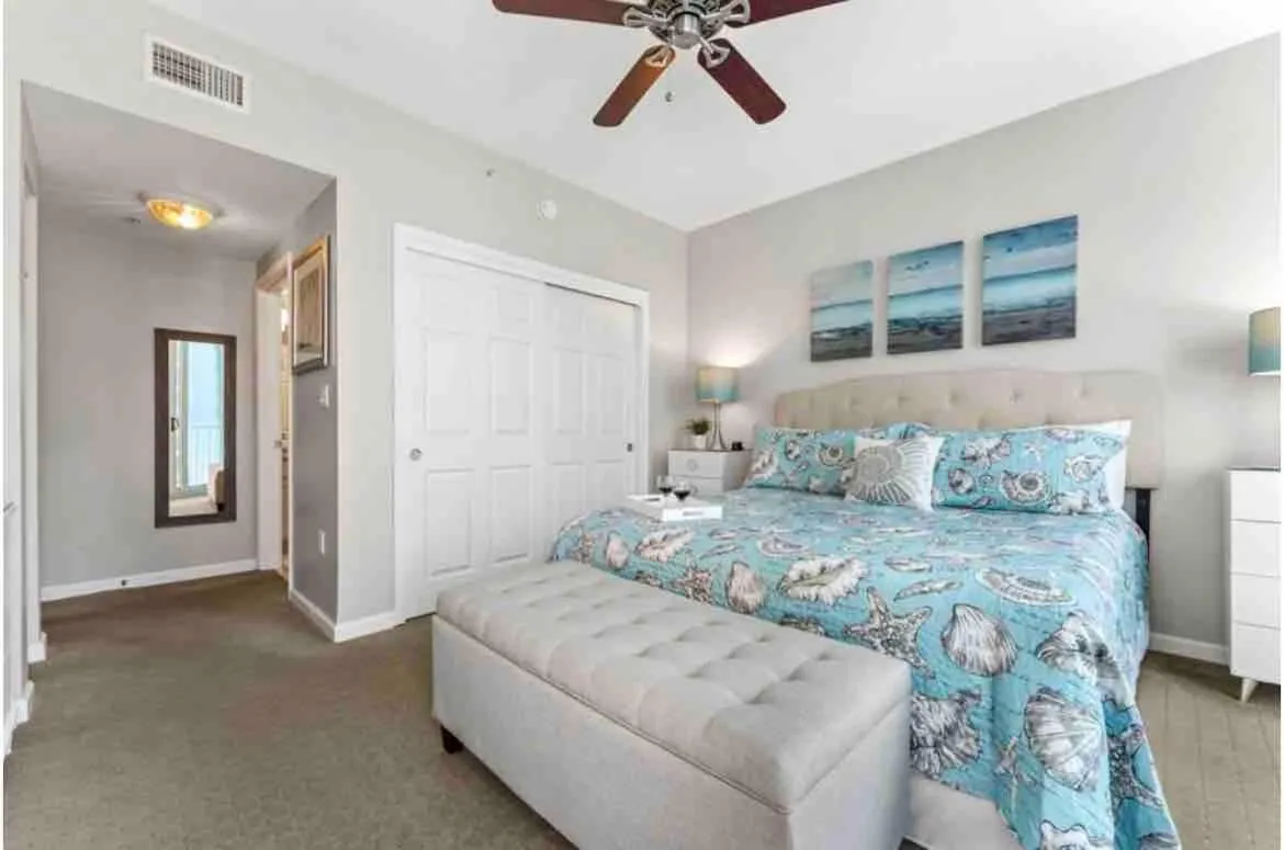 Bed in Pink Sunsets at the Palms of Destin Across from Beach, Heated Pool Shuttle & Dining
