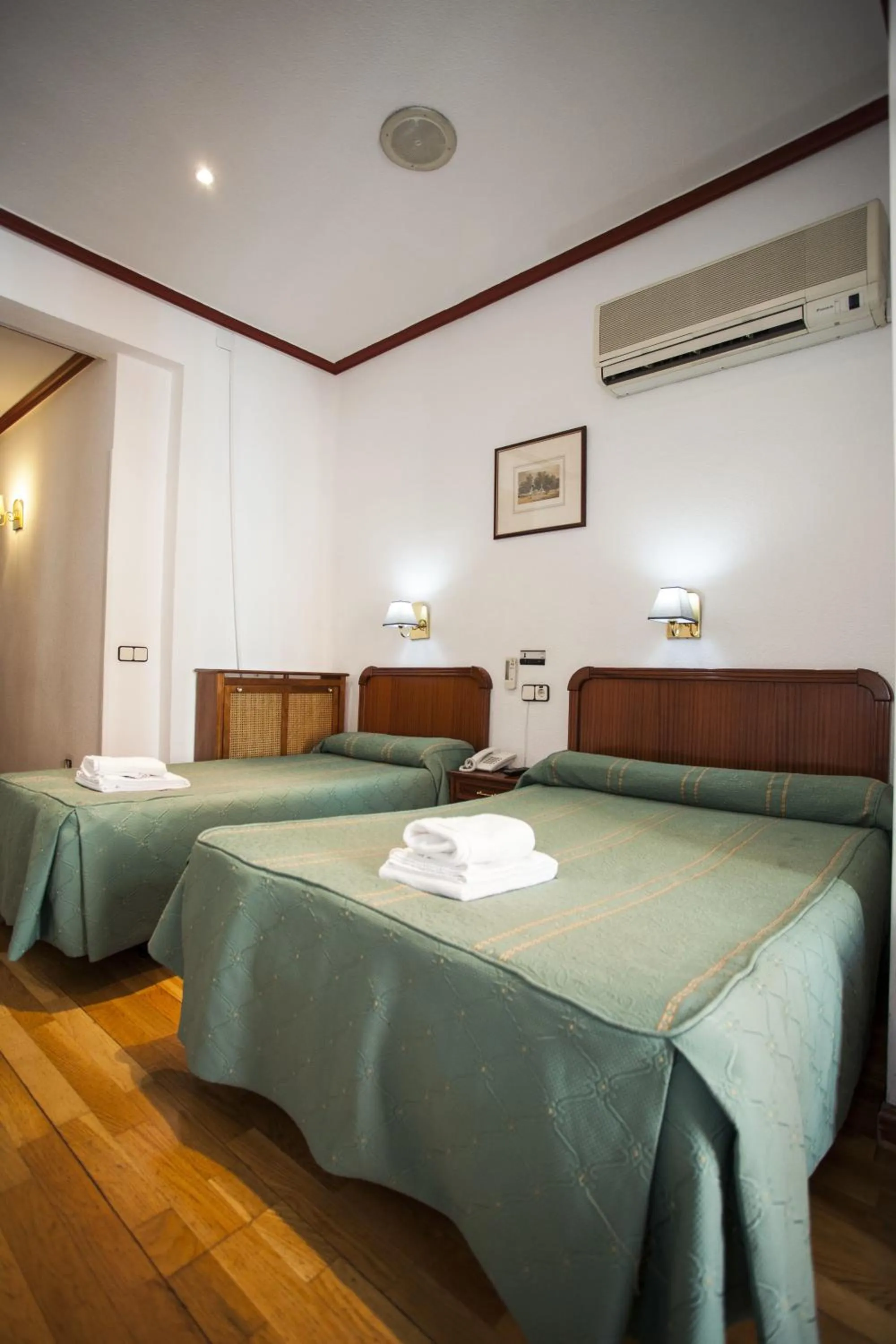 Bed in Pensión Carrera