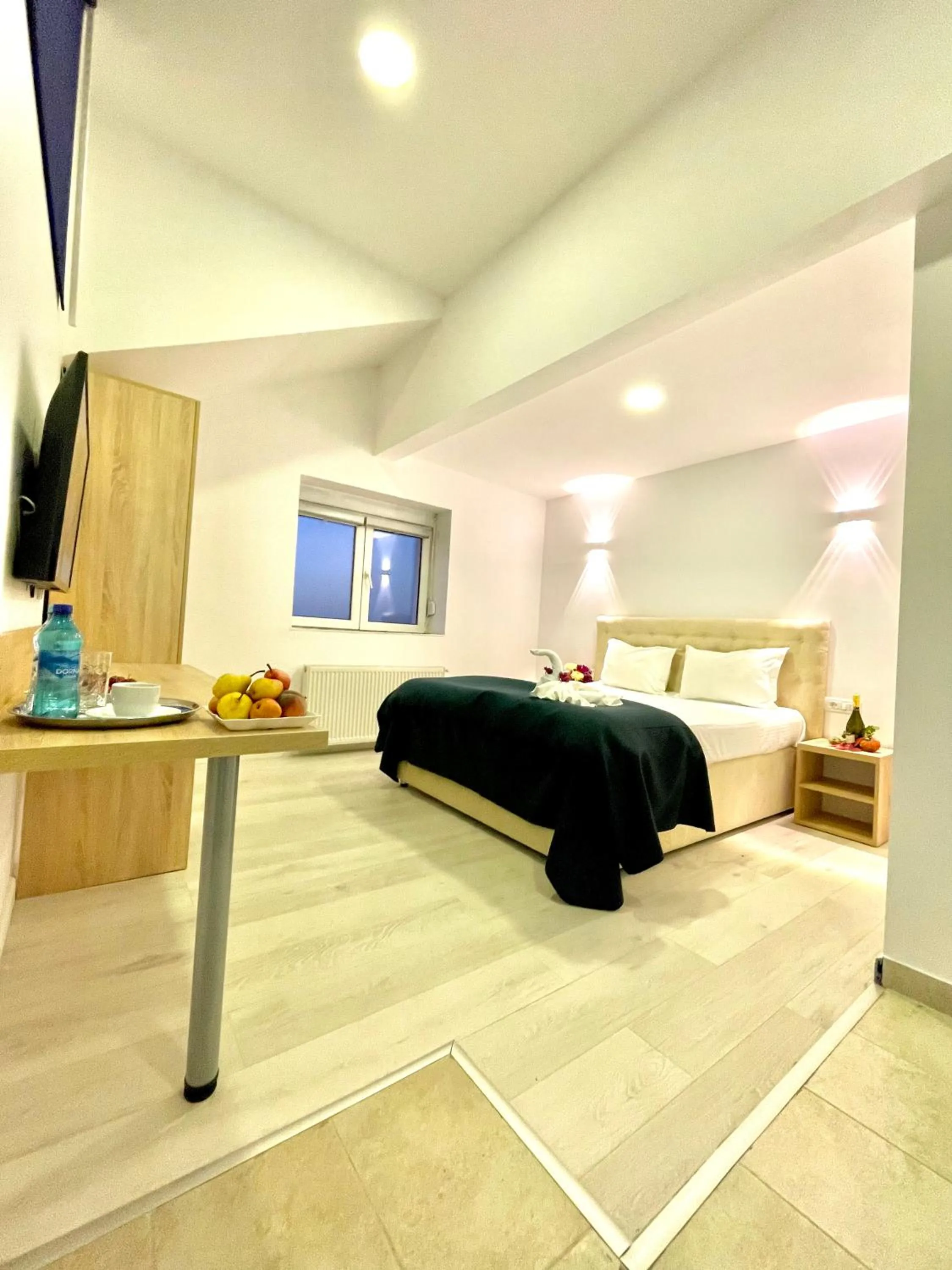 Bed in Floria Hotels