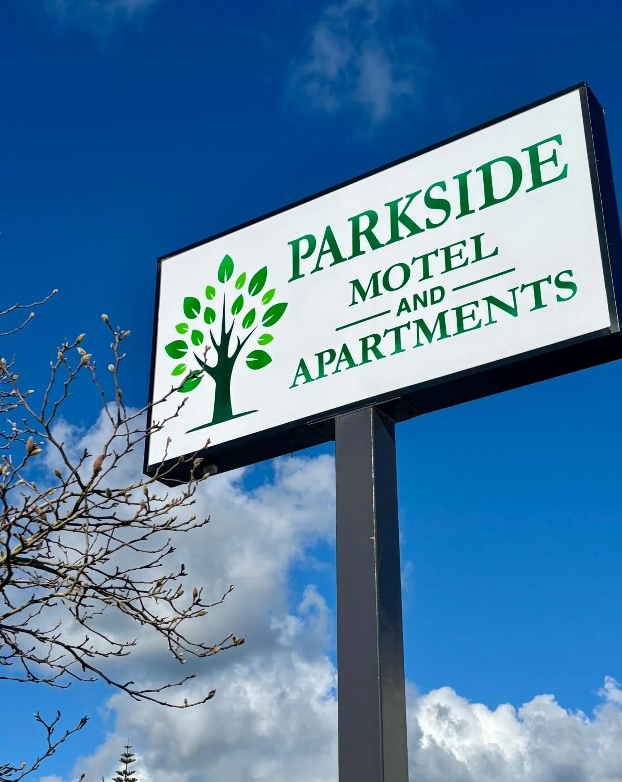 Property logo or sign in Parkside Motel and Apartments