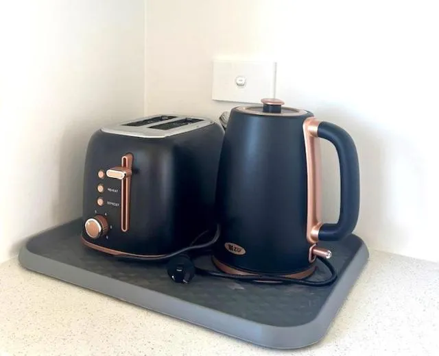 Kitchen or kitchenette in Parkside Motel and Apartments