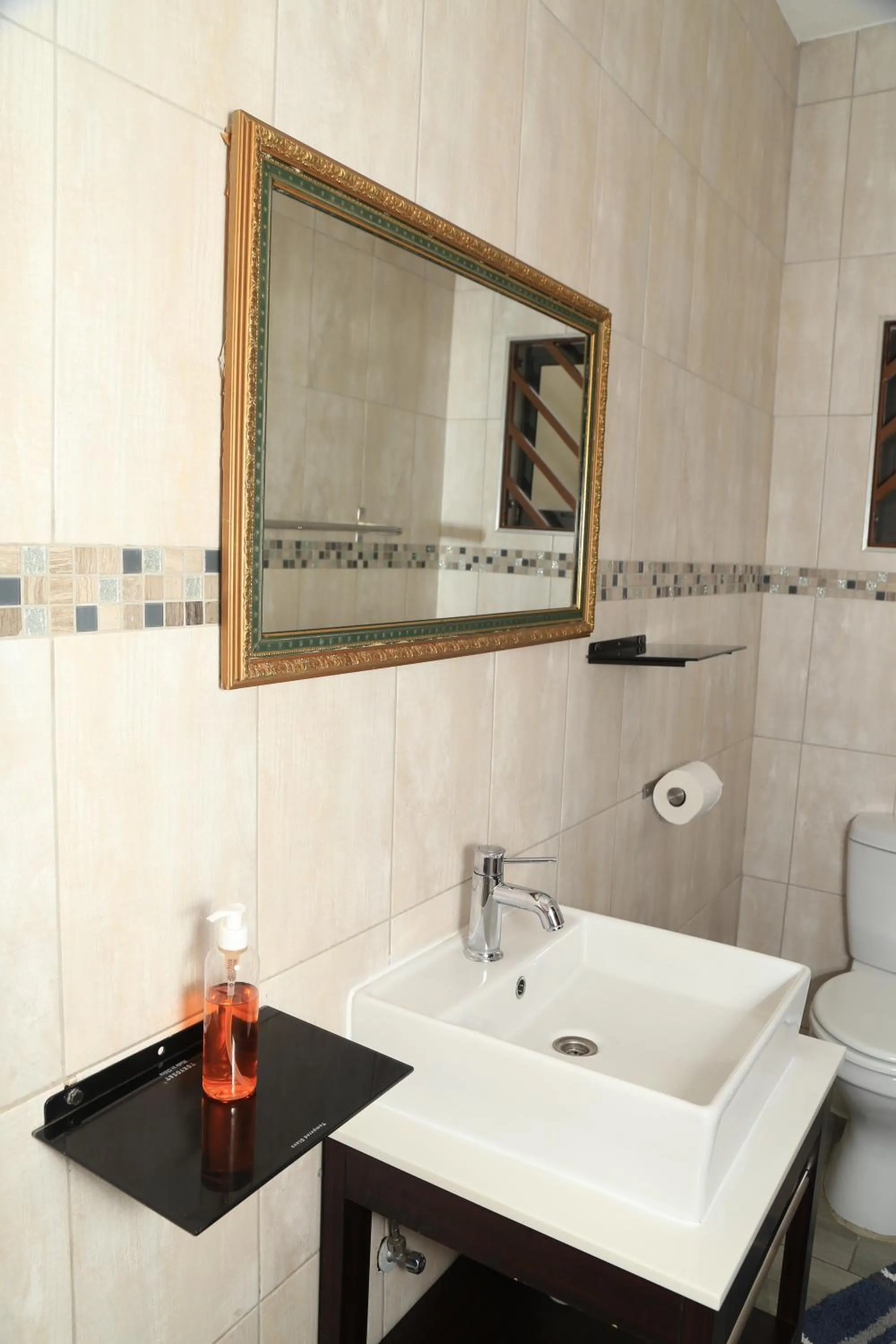 Bathroom in Coco Palm Bed & Breakfast