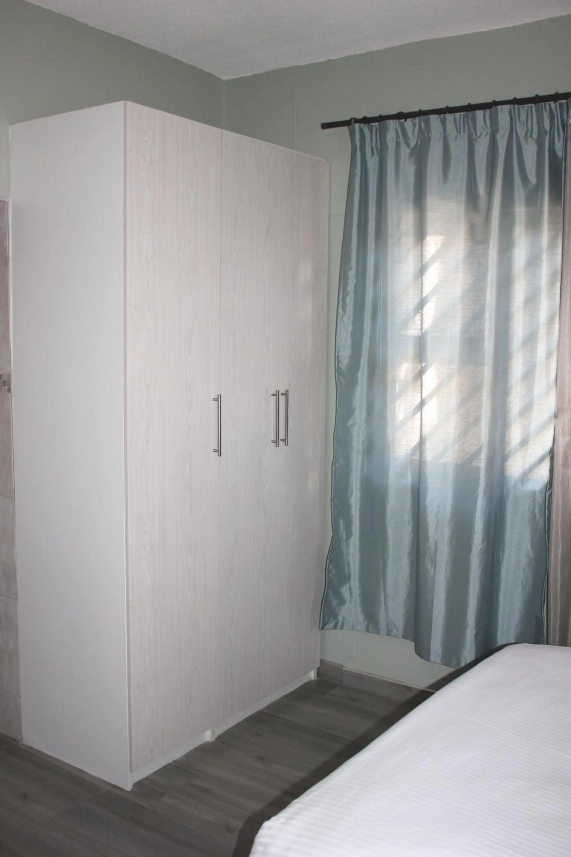 wardrobe in Coco Palm Bed & Breakfast