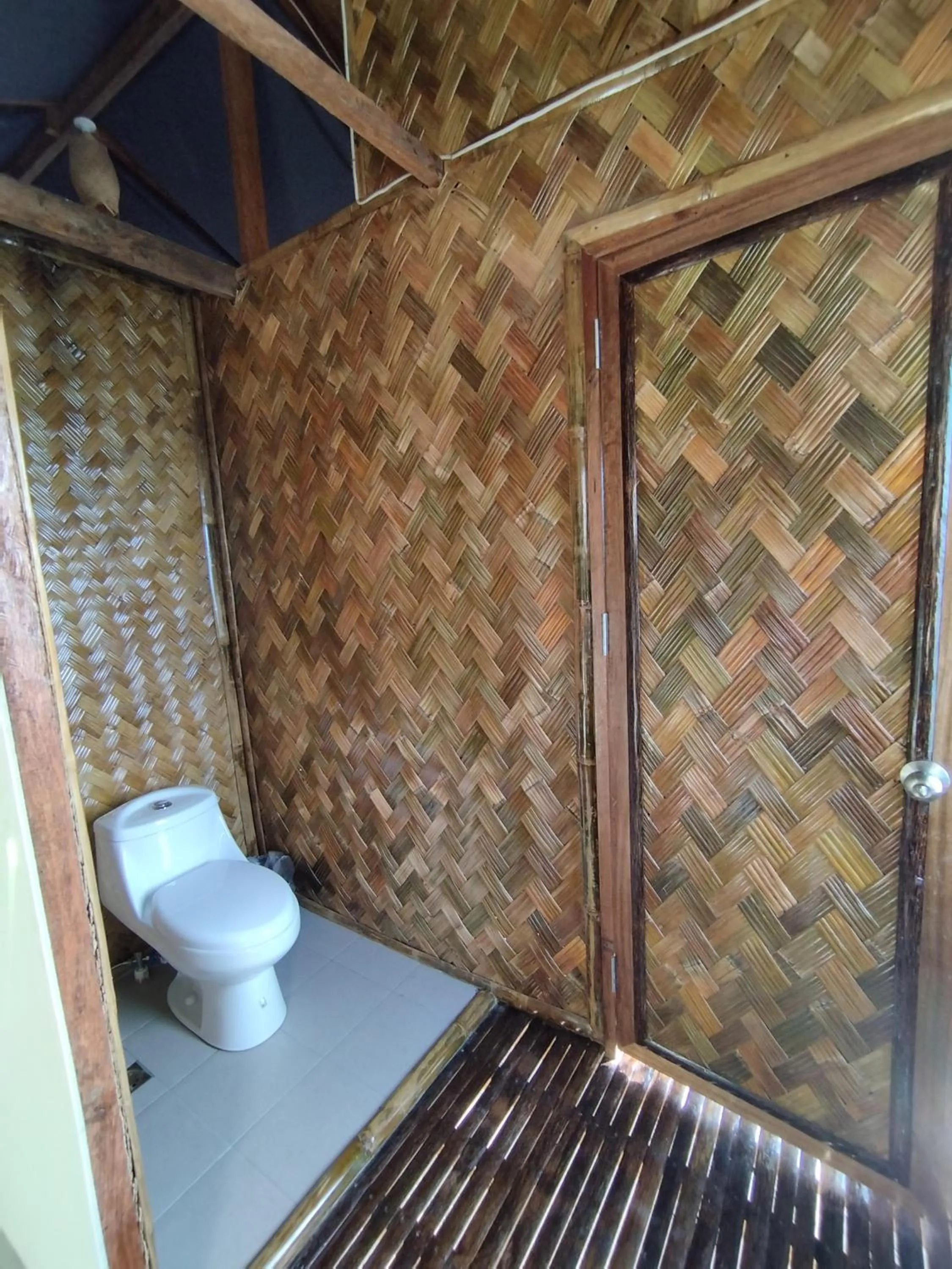 Toilet in Ocean Green Eco Lodge