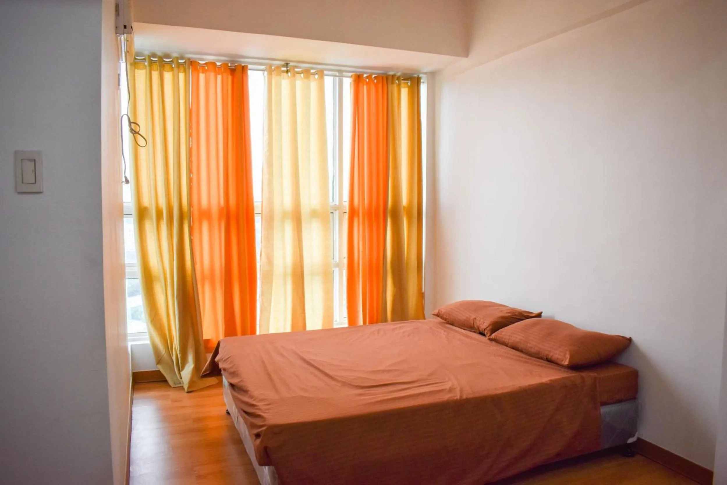 Photo of the whole room, Bed in The Boni Tower by RSPL Manila City Center