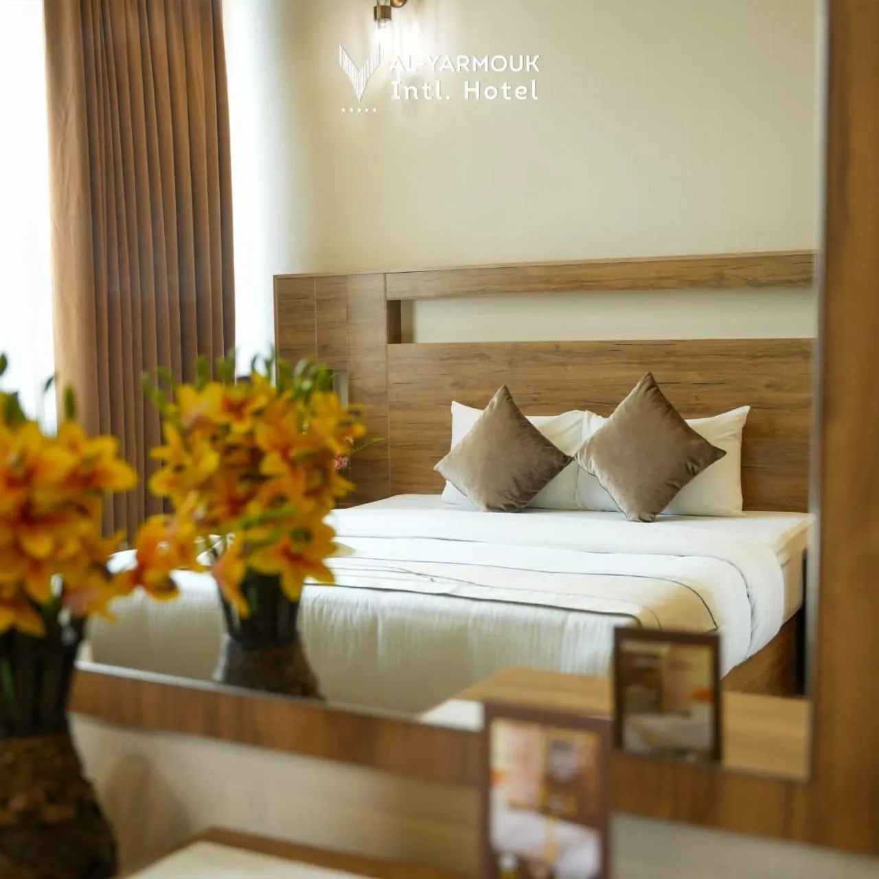 Bed in Al Yarmouk International Hotel