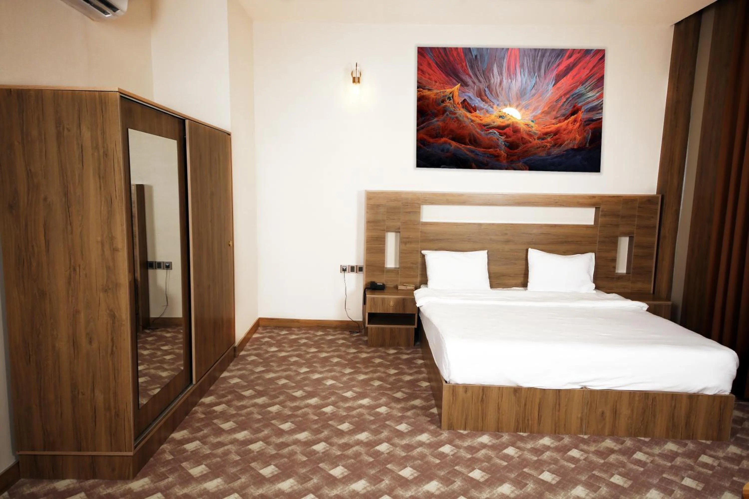 Bed in Al Yarmouk International Hotel