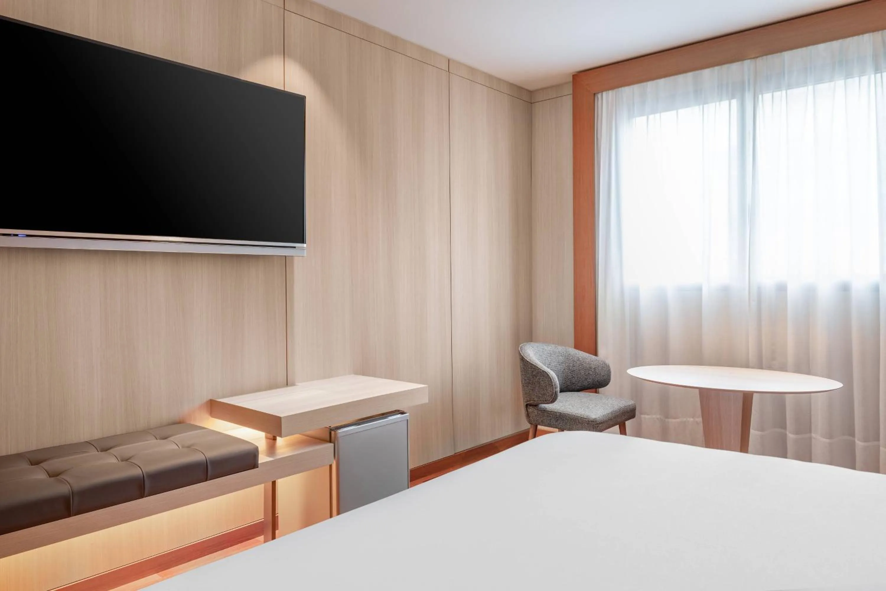 Photo of the whole room, Bed in AC Hotel Huelva by Marriott