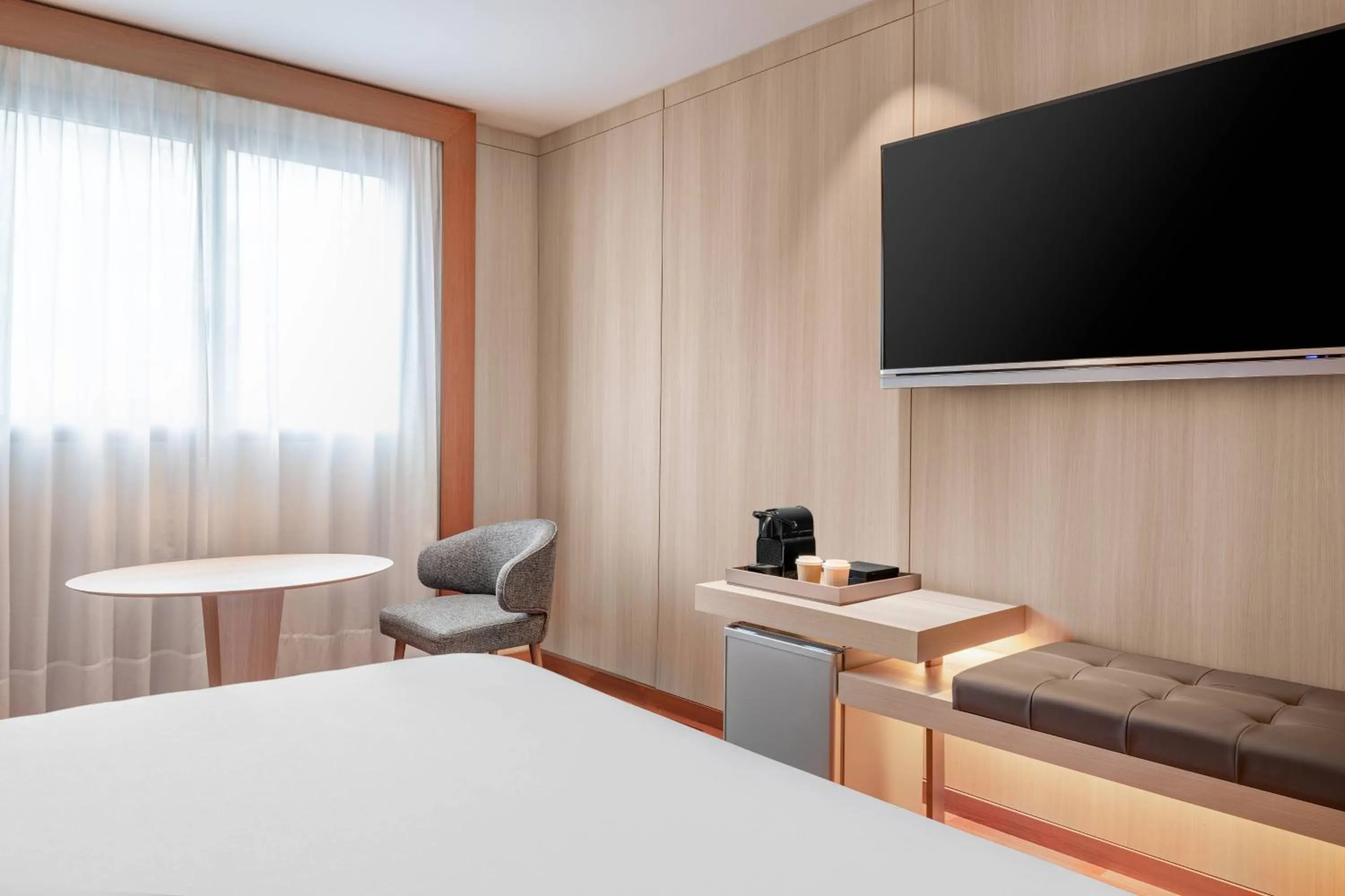 Photo of the whole room, Bed in AC Hotel Huelva by Marriott