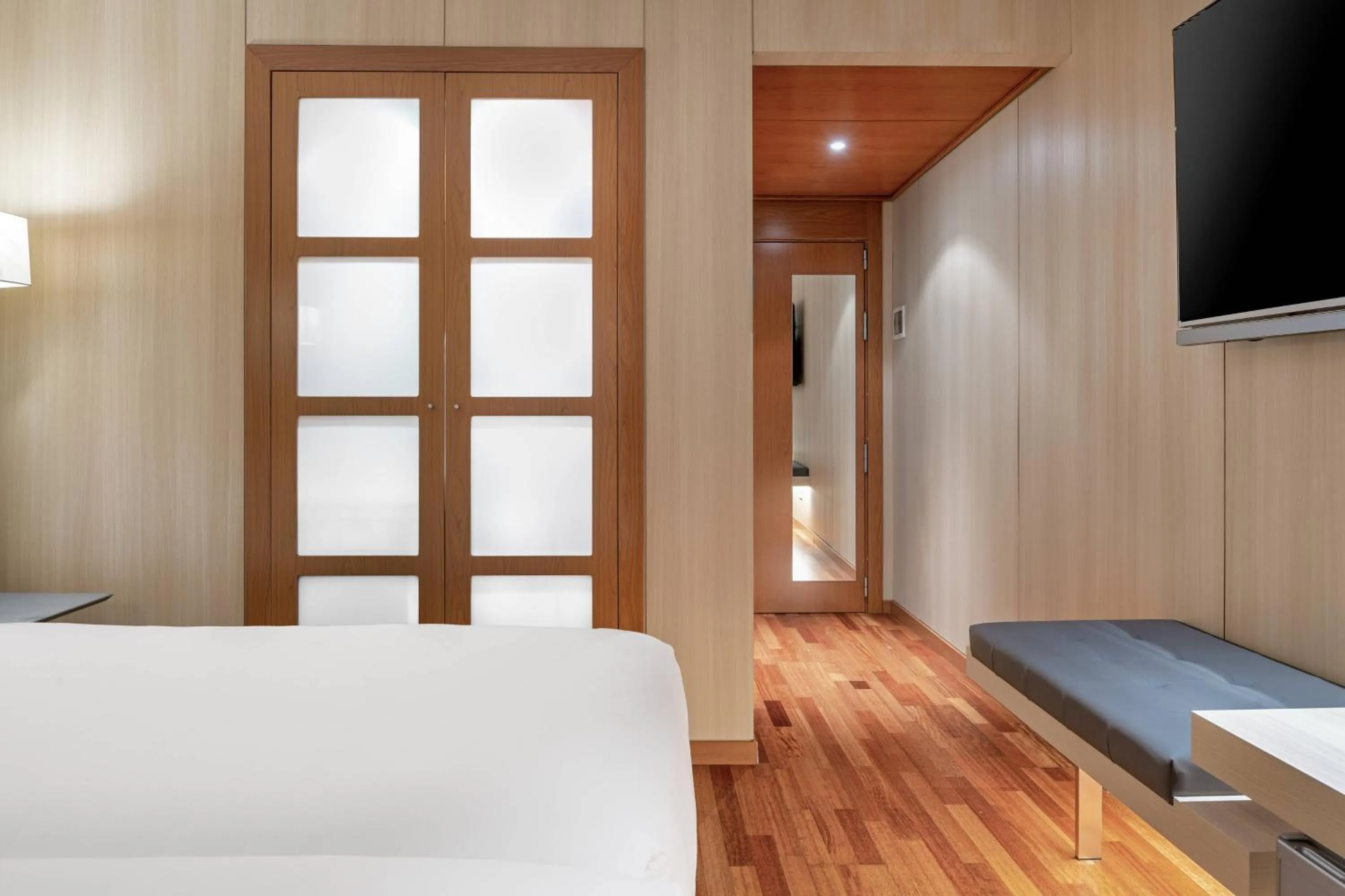 Photo of the whole room, Bed in AC Hotel Huelva by Marriott