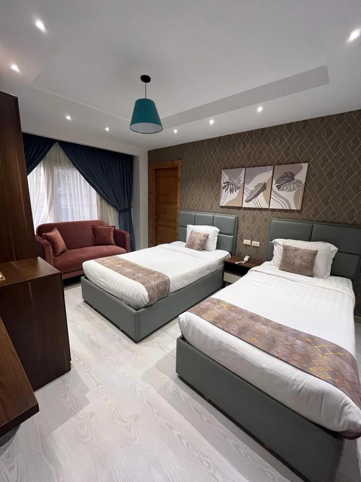 Bed in Jasmine Pyramids Hotel