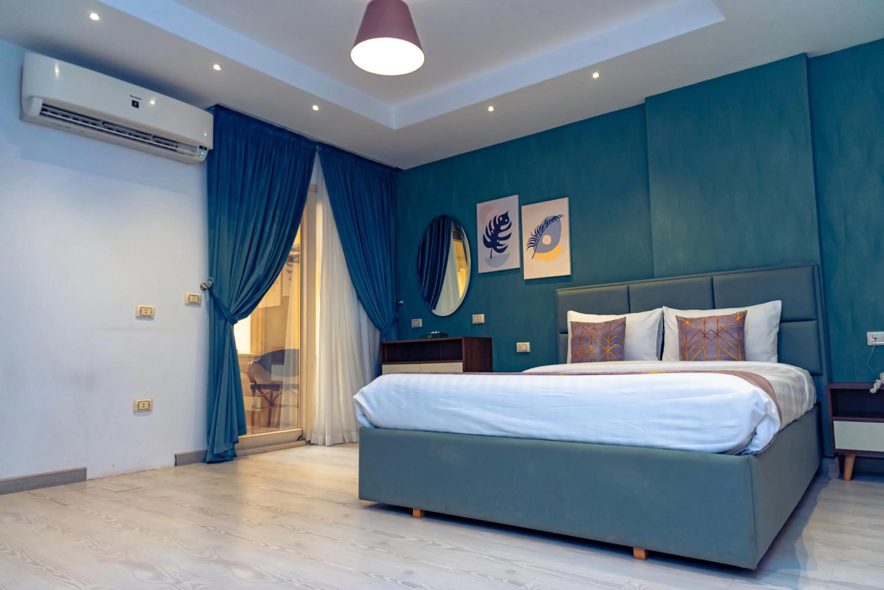 Bed in Jasmine Pyramids Hotel