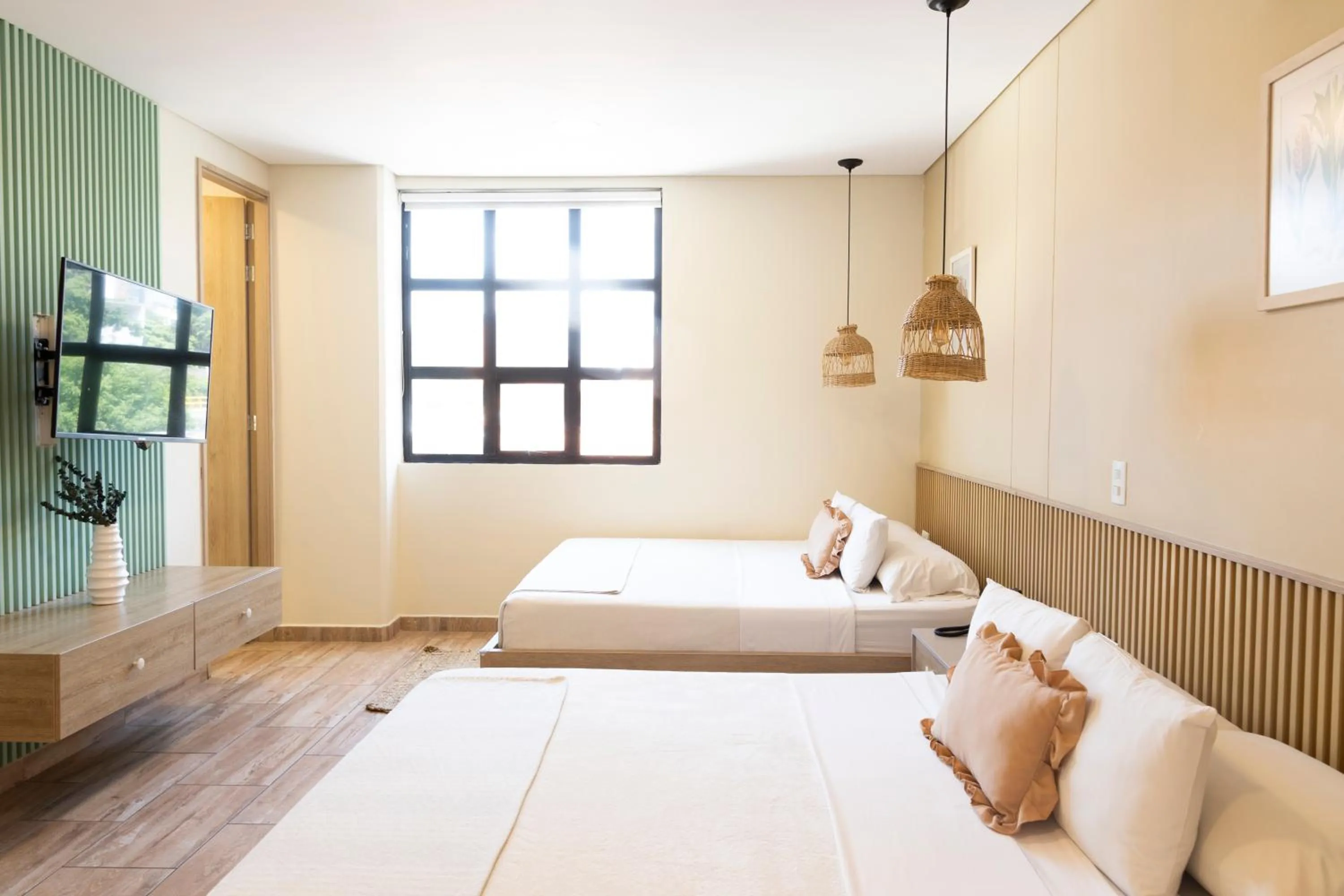 Bed in Mythical Hotel Boutique