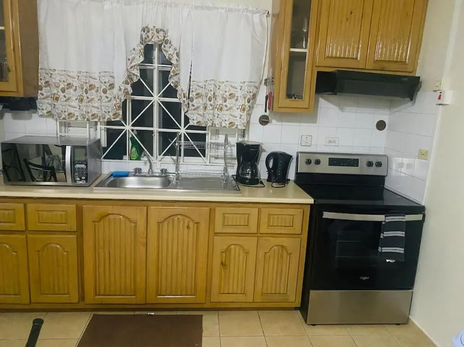 Kitchen or kitchenette in Club Caribbean Apartments