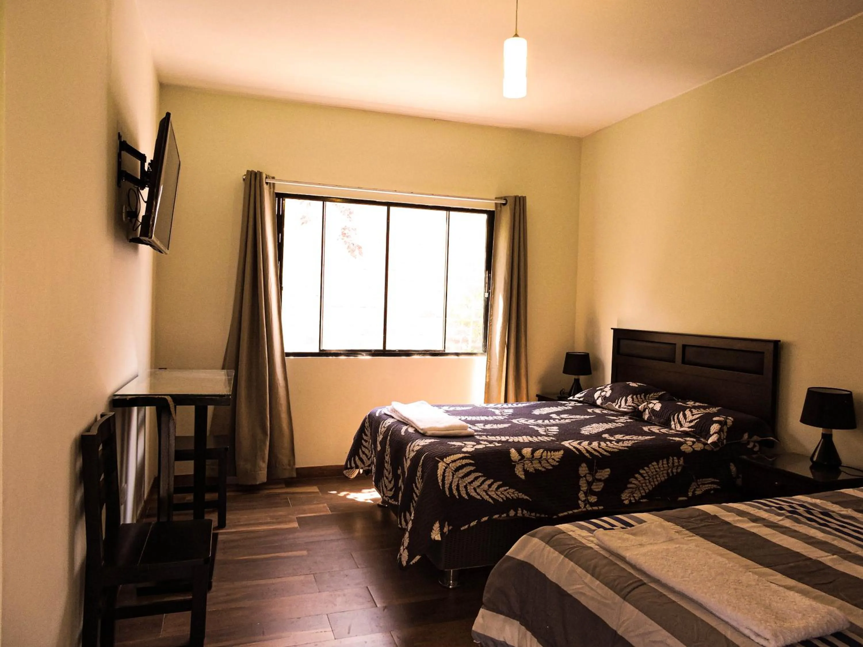 Bed in Casa Hotel Mamaluna