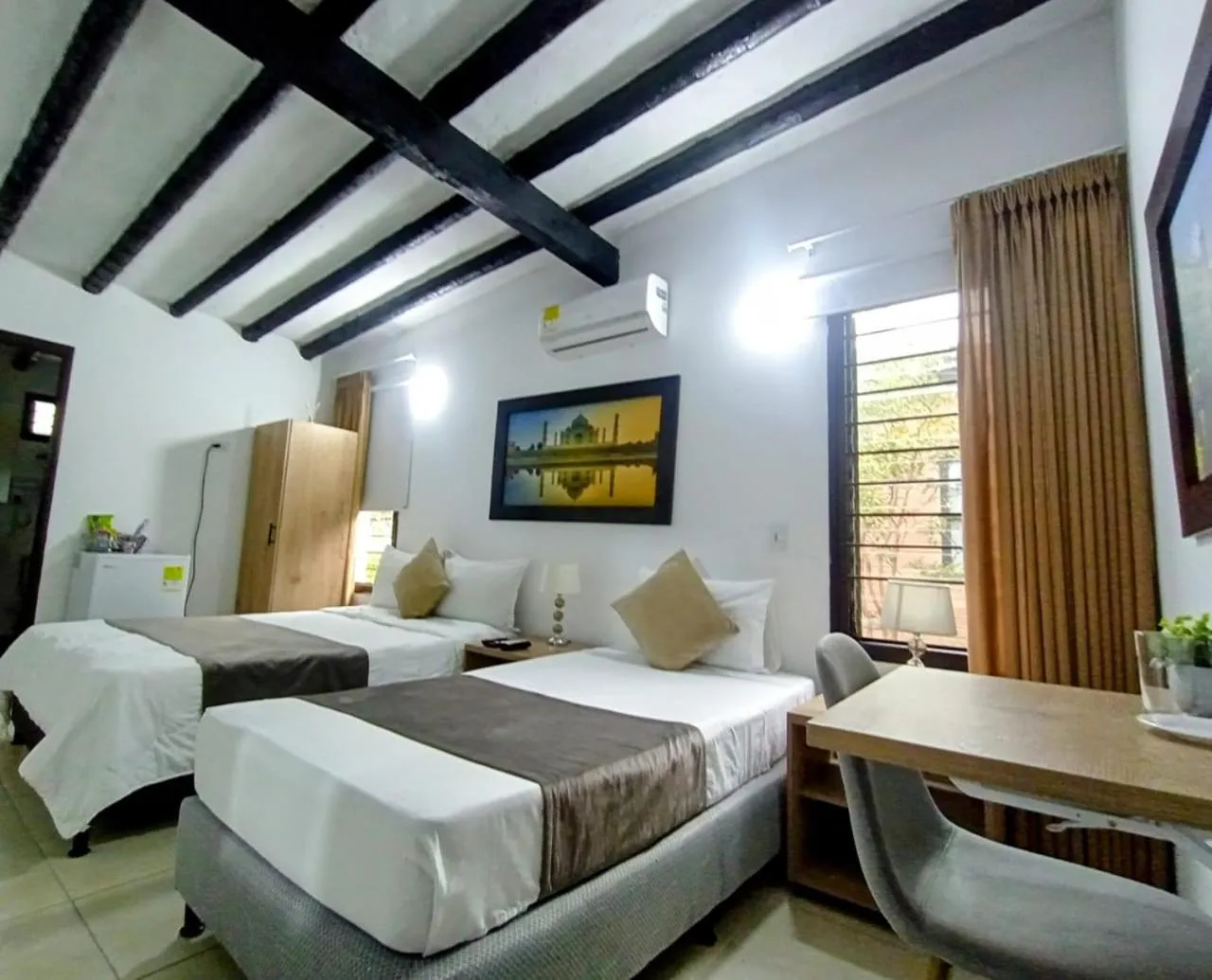 Bed in Aguacatala Hotel Boutique