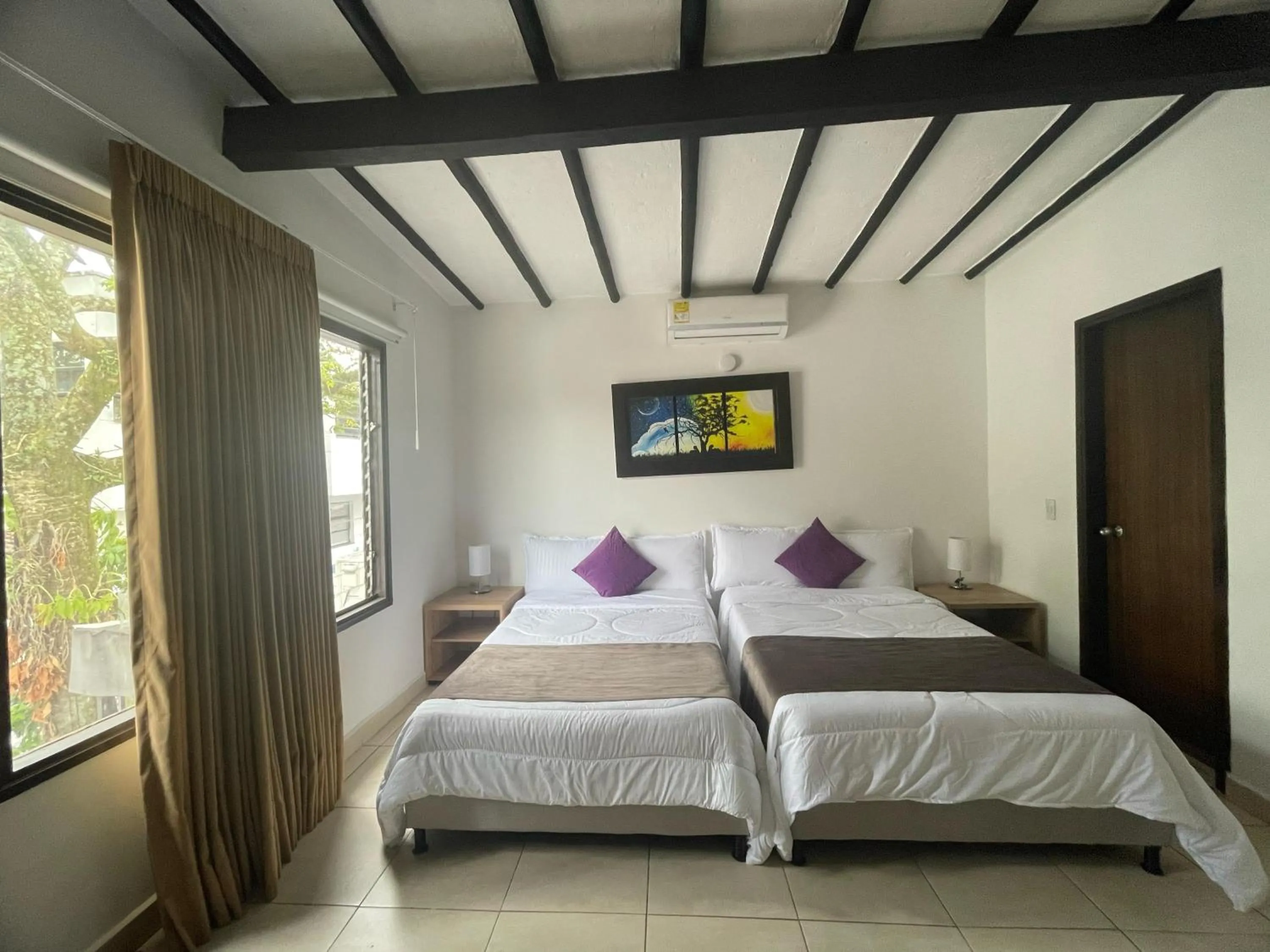 Bed in Aguacatala Hotel Boutique