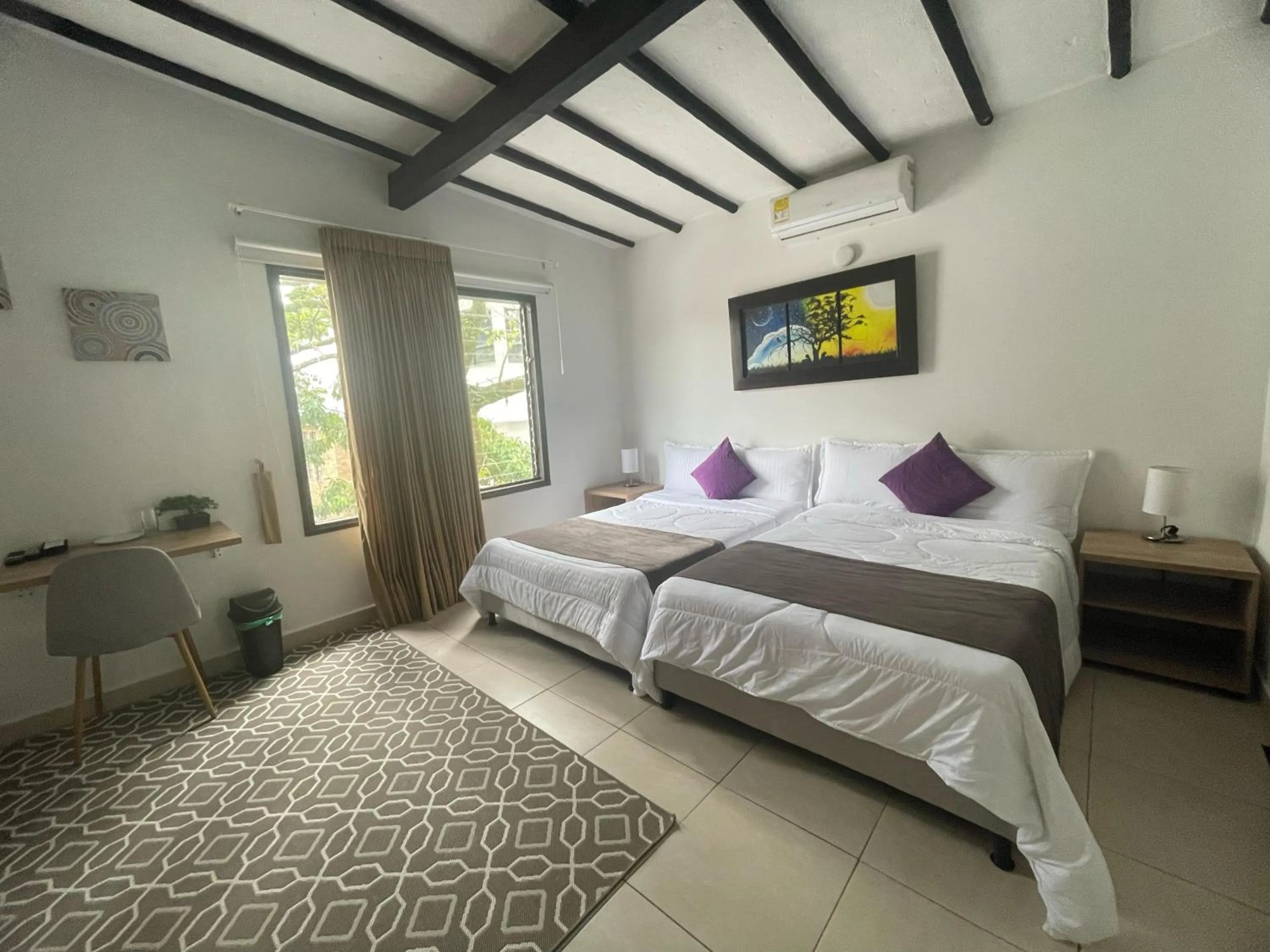 Bed in Aguacatala Hotel Boutique