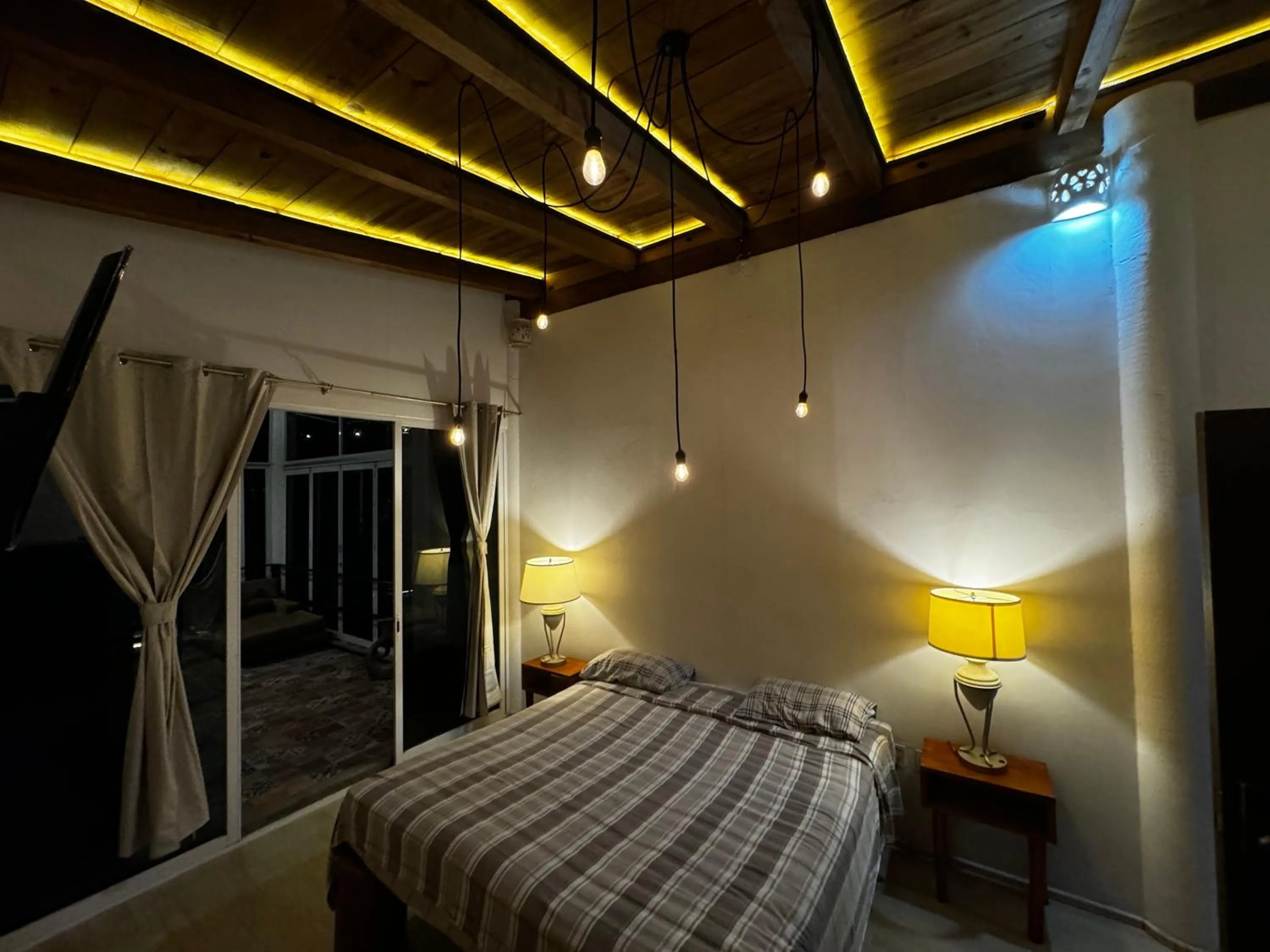Bed in Magnolias Jardin & Boutique Suites