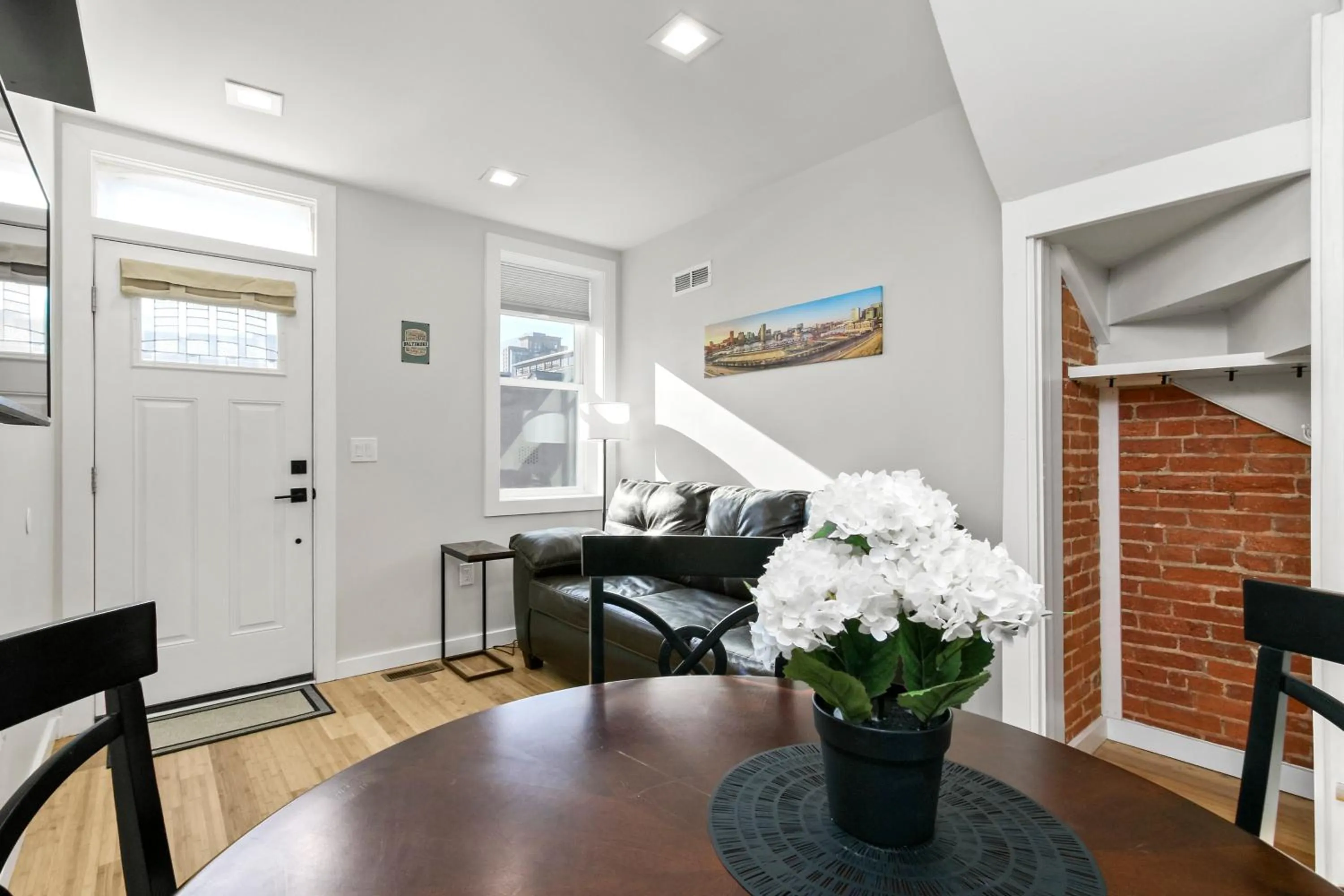 Living room in Cozy Ba Townhome Near Little Italy I Fells Point
