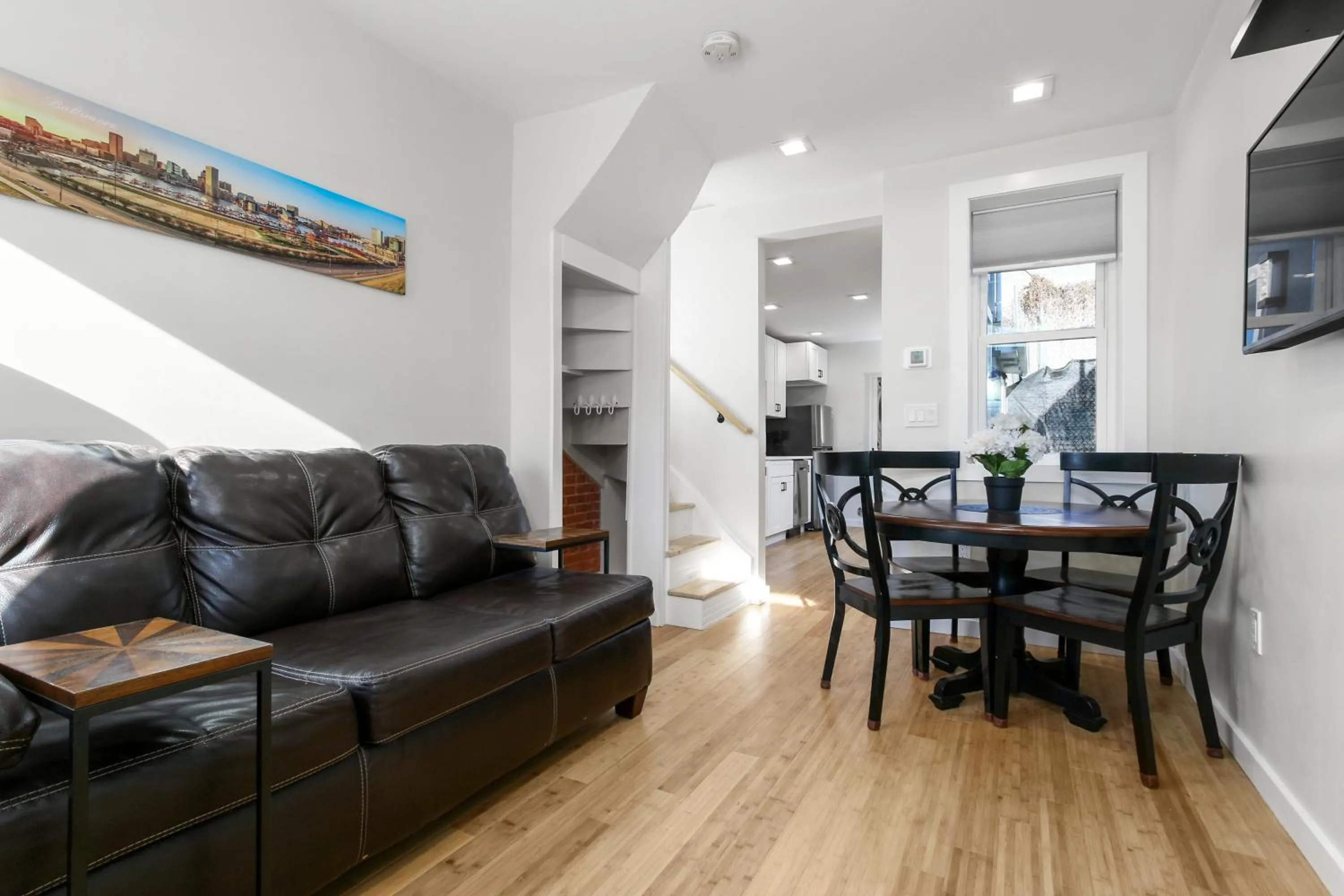 Living room in Cozy Ba Townhome Near Little Italy I Fells Point