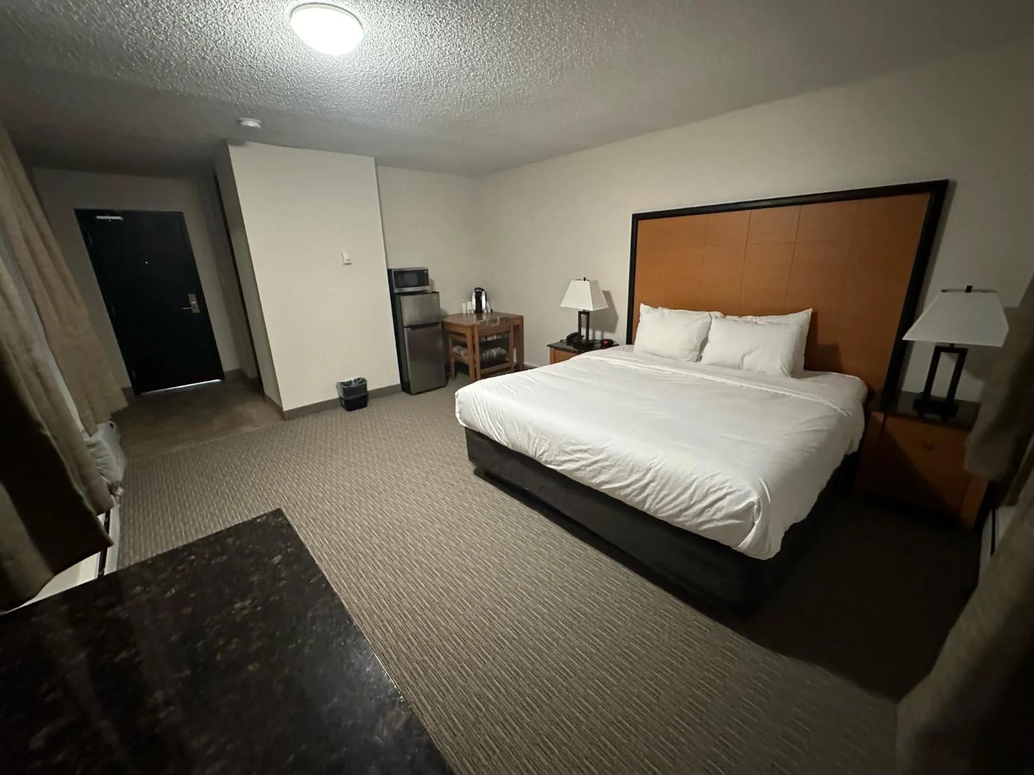 Bed in Anavada Inn & Suites - Grande Prairie