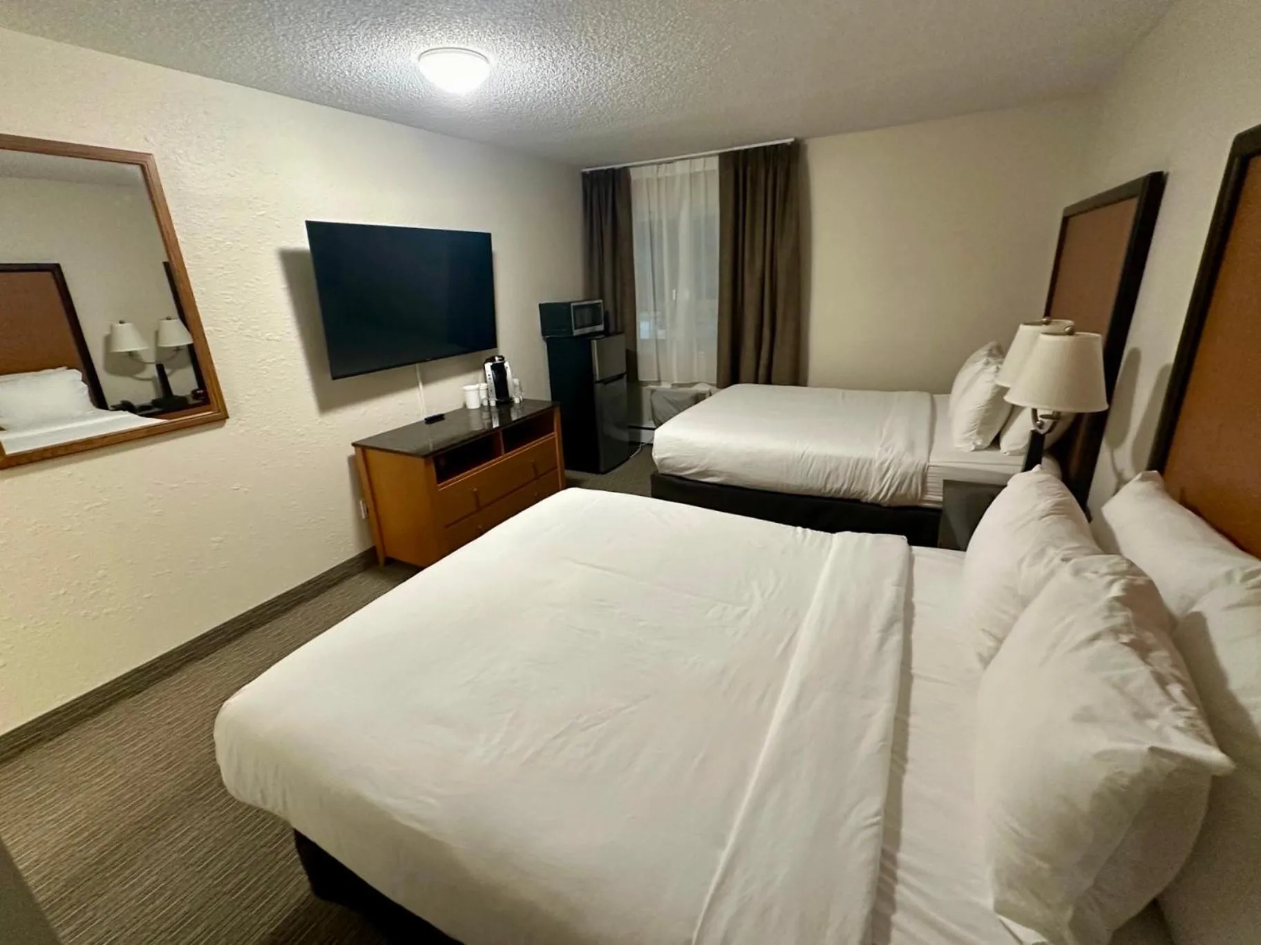 Bed in Anavada Inn & Suites - Grande Prairie