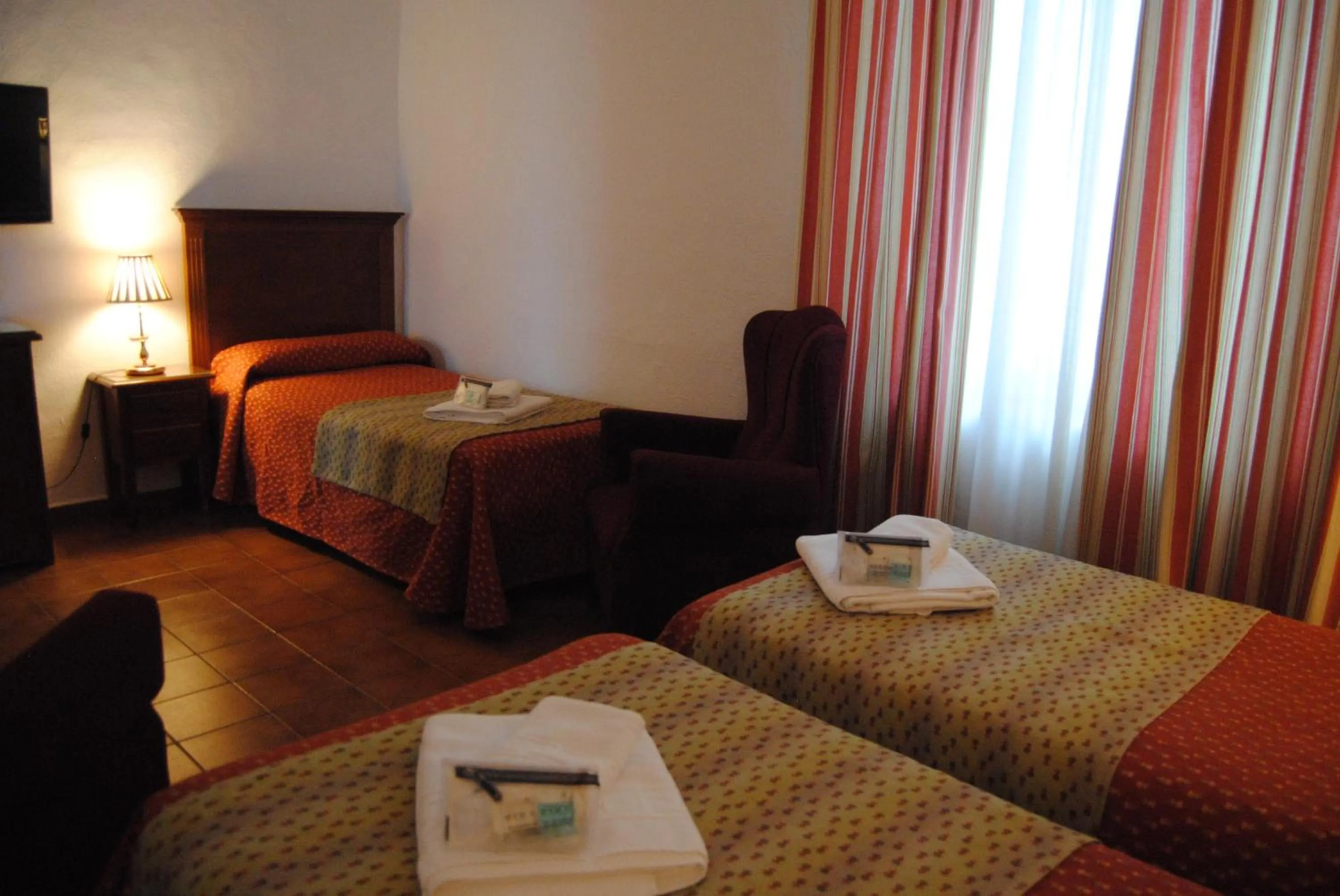 Bed in Hotel Los Olivos