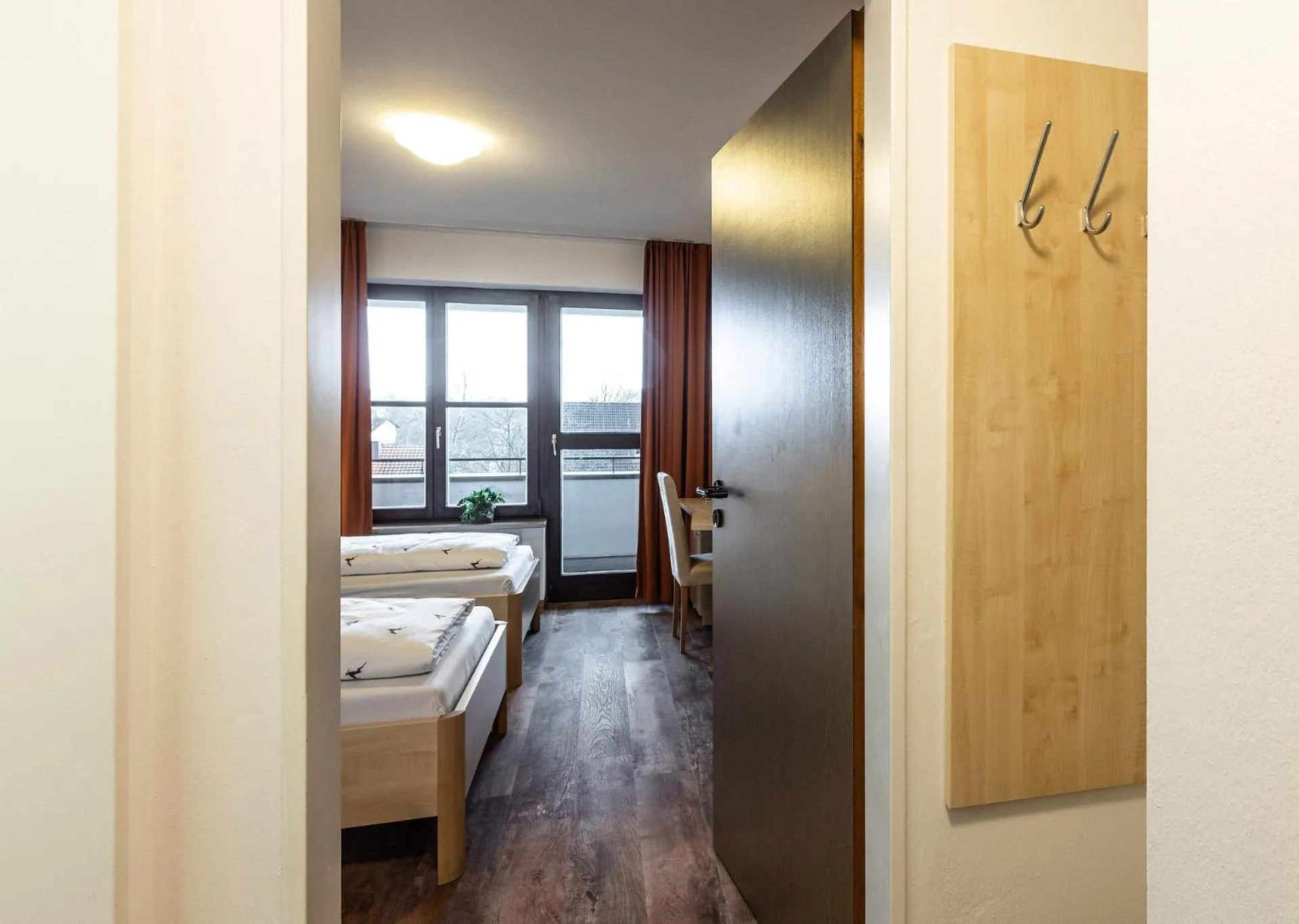 Photo of the whole room, Bed in Brauereigasthof Hofmark