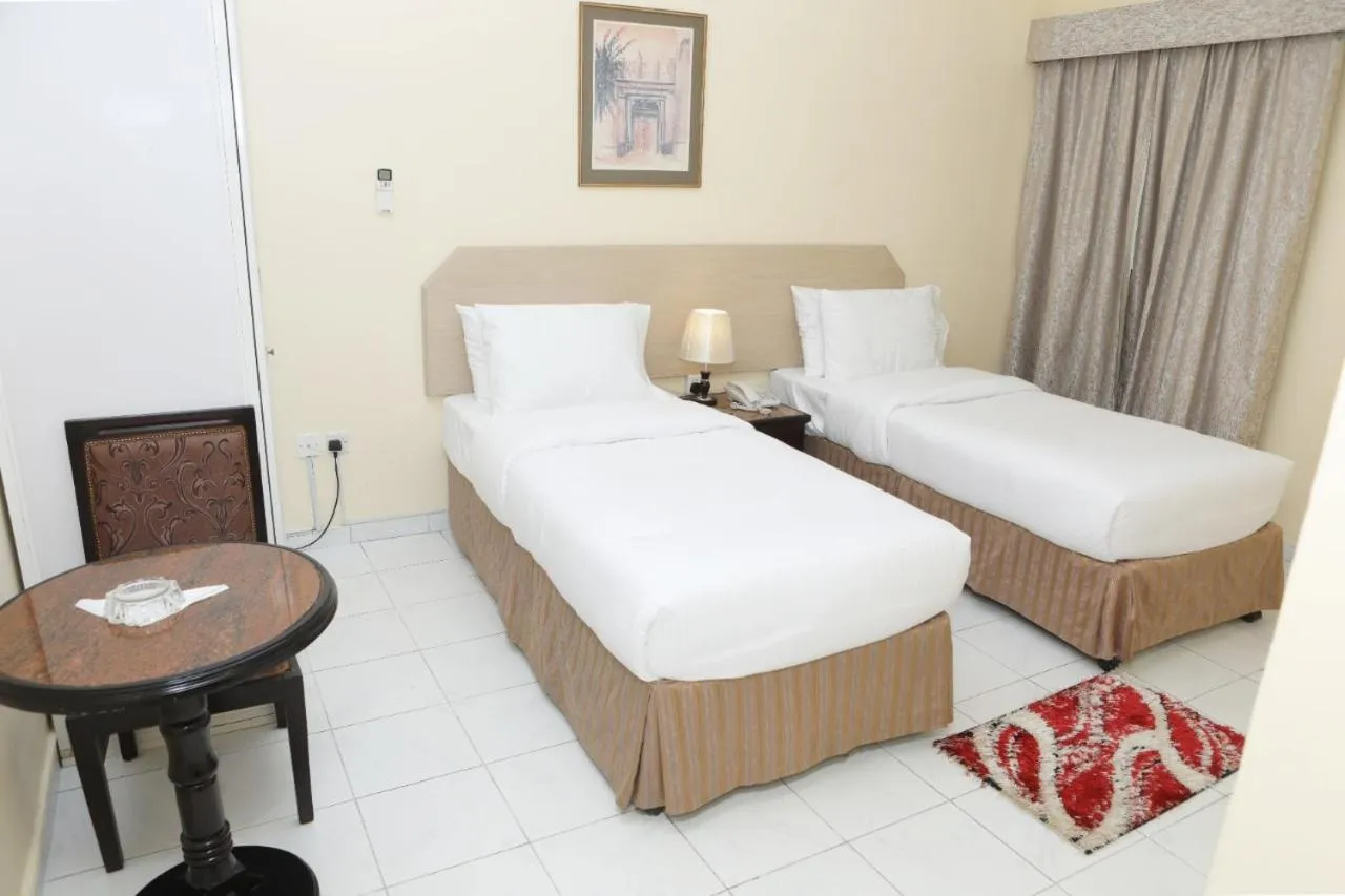 Bed in Blue Sky Way Hotel