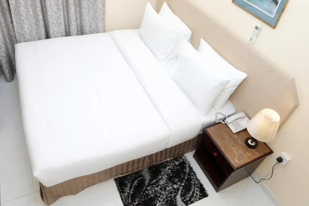 Bed in Blue Sky Way Hotel