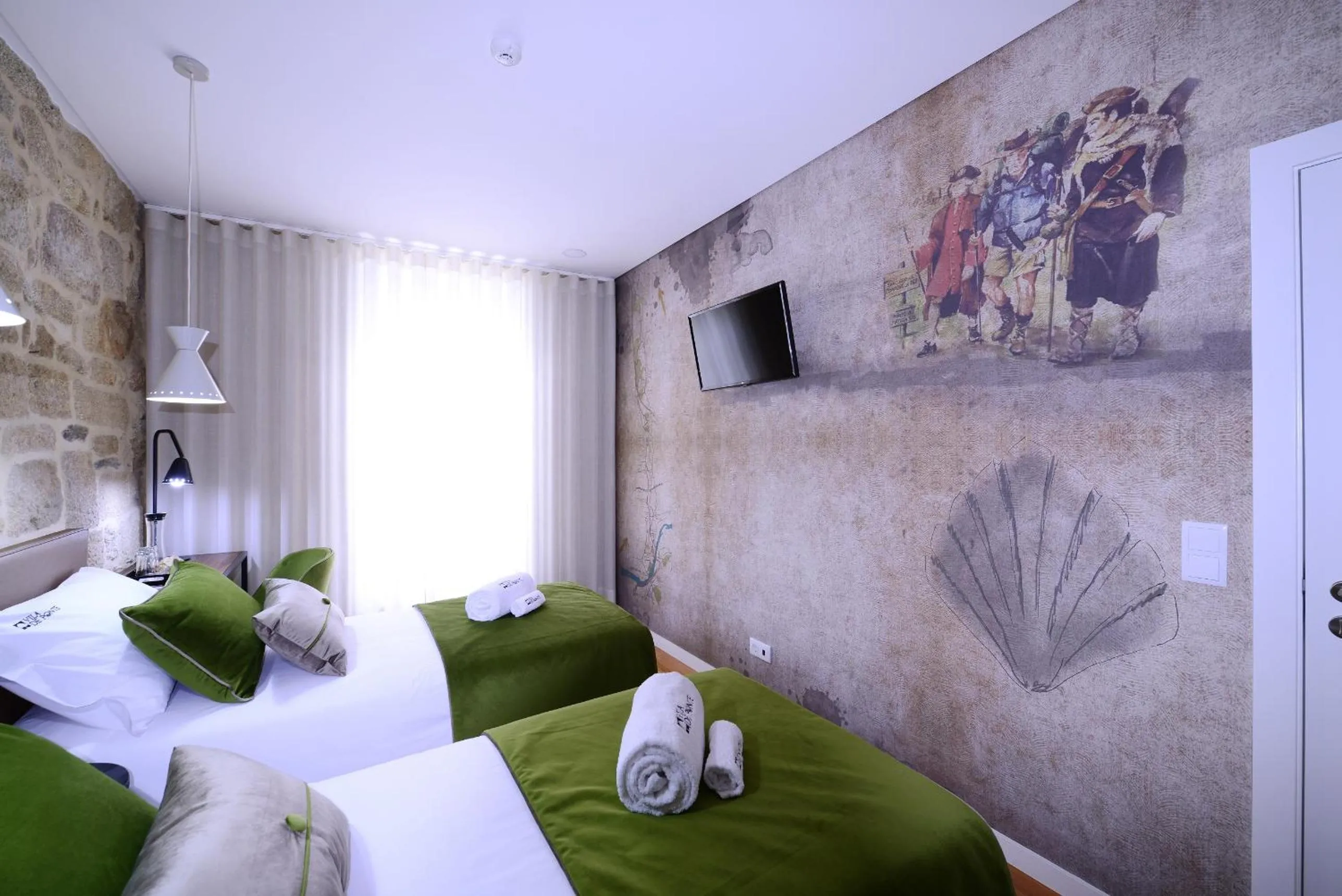 Bed in VILA DE PONTE GUEST HOUSE