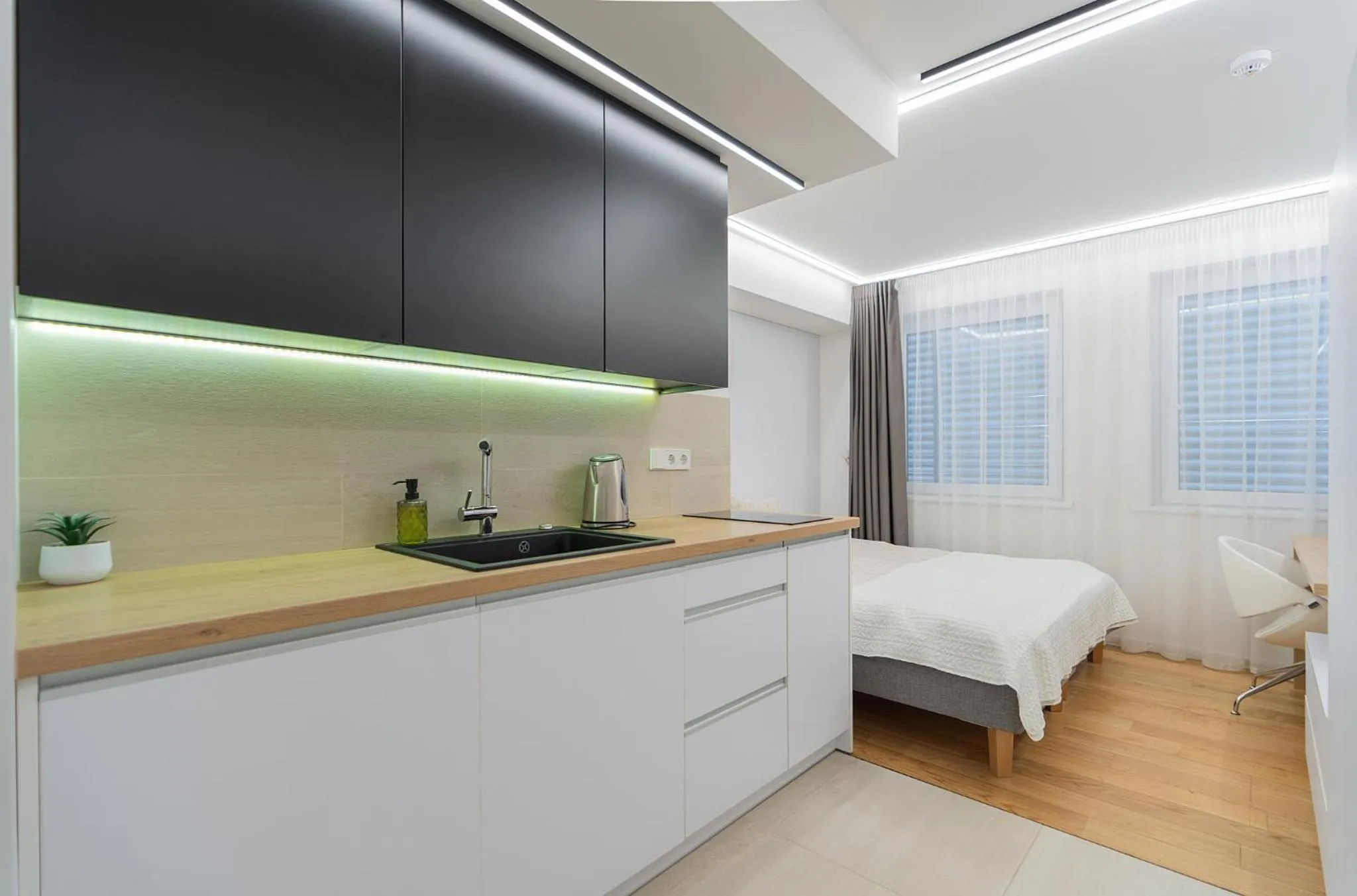 Kitchen or kitchenette, Bed in Gynėjų Self Check-in Apartments - Lollo Stay