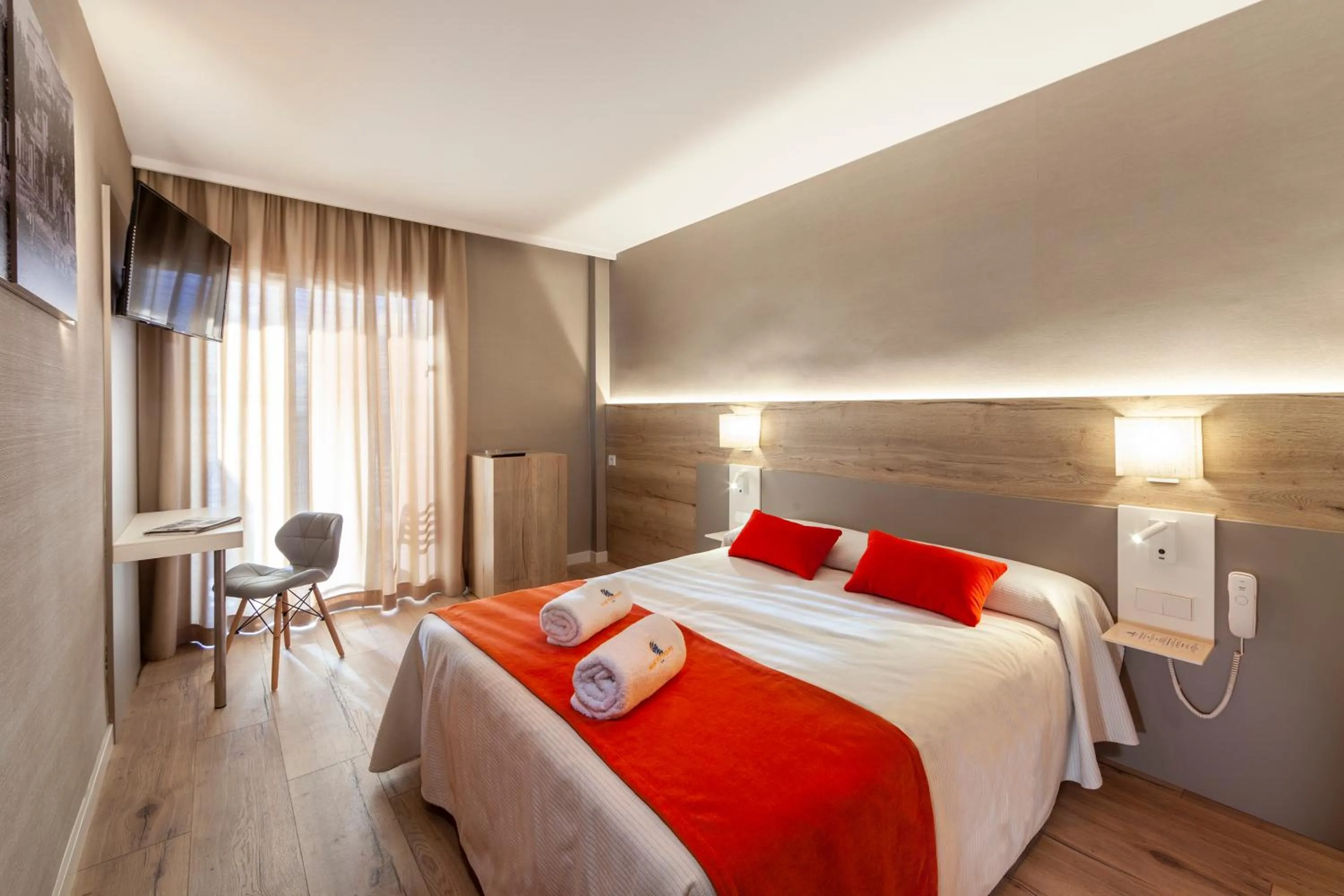 Bed in Hotel Montecarlo Spa & Wellness