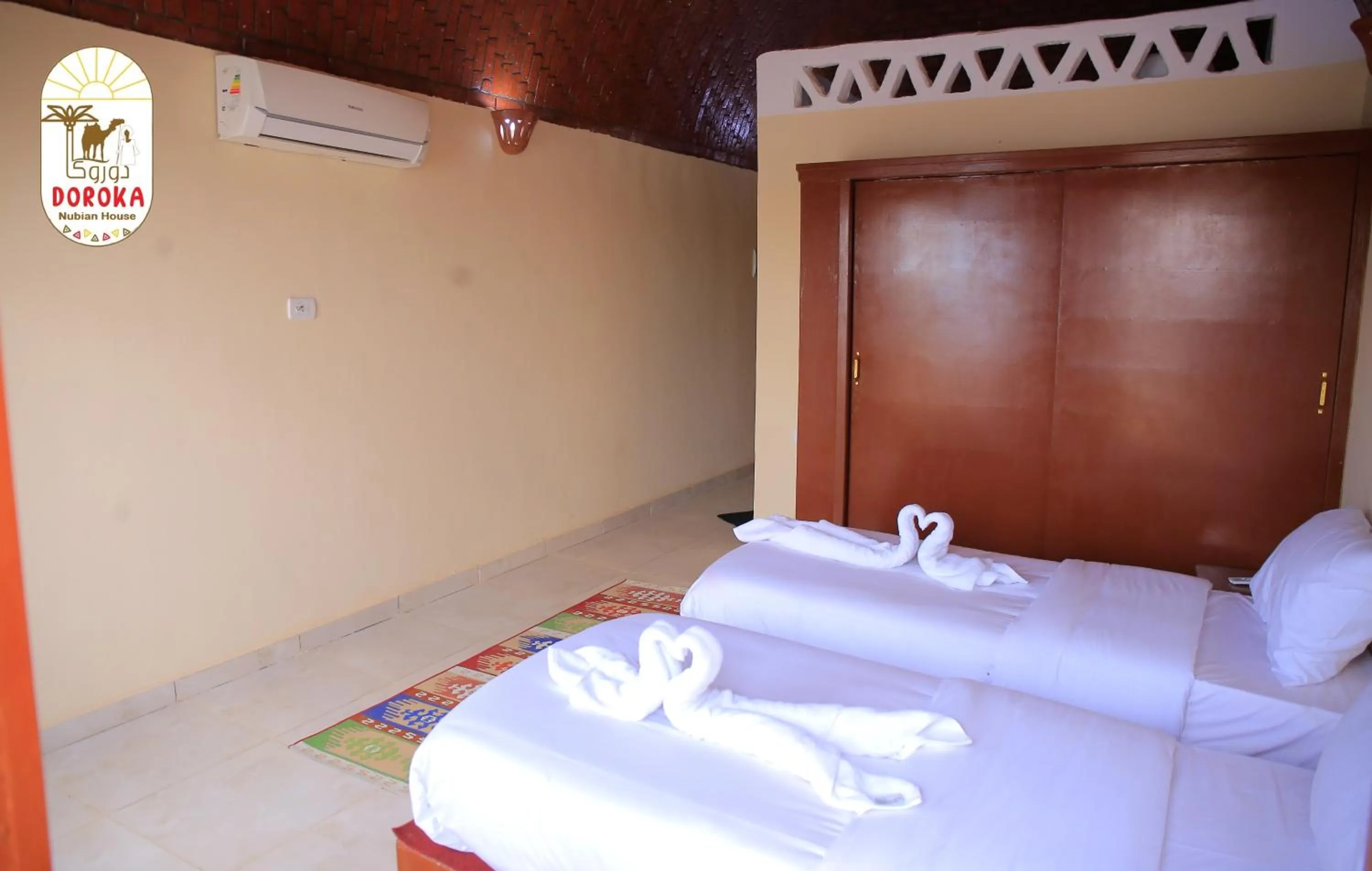 Photo of the whole room, Bed in DoroKa Nubian House