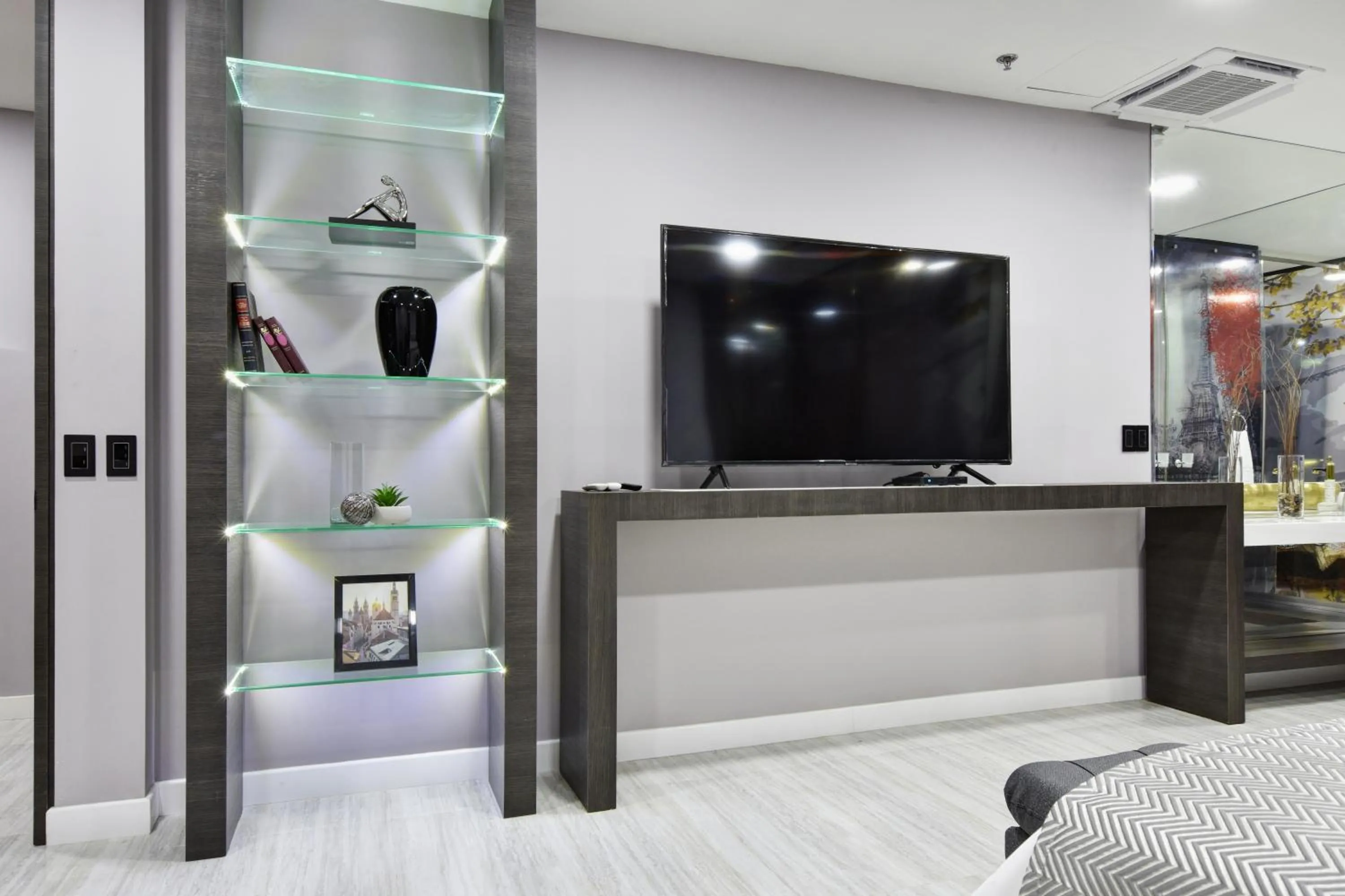 Communal lounge/ TV room in 1Million Luxury Suites