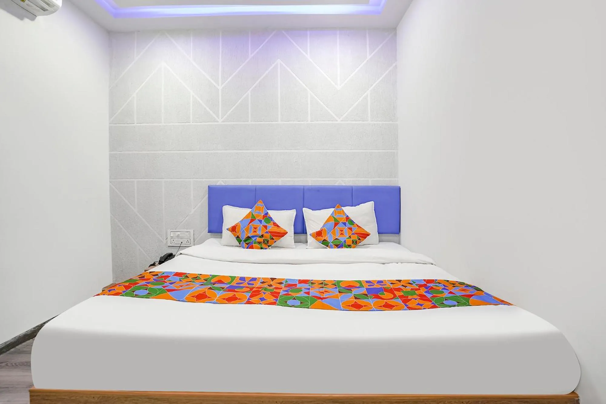 Bed in FabHotel Vrundavan - Nr Sargam Shopping Center