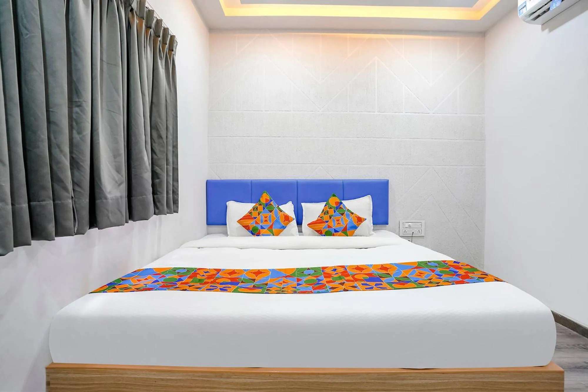 Bed in FabHotel Vrundavan - Nr Sargam Shopping Center