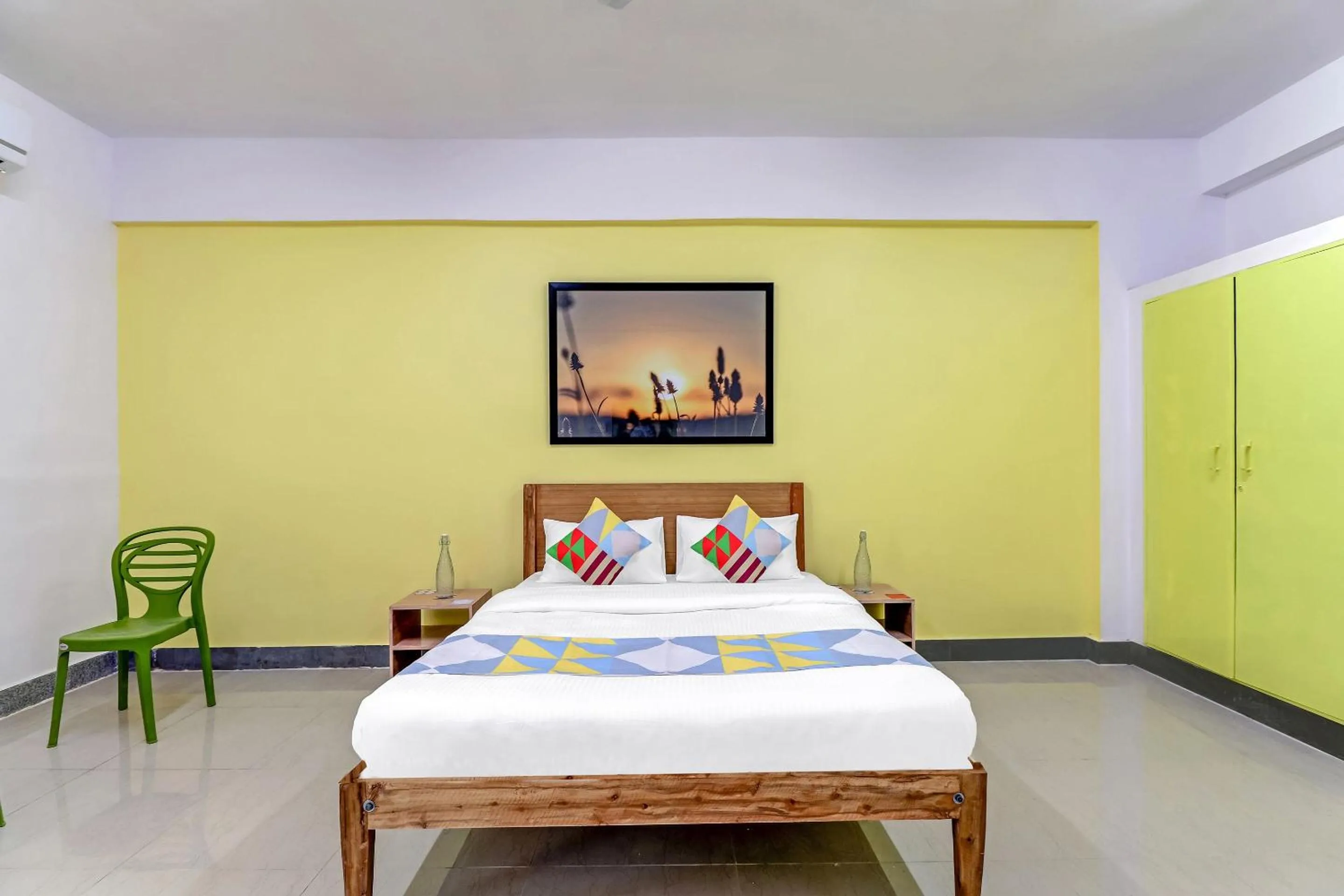 Bedroom, Bed in Capital O Elite Stay Jp Nagar Near SRI SATHYA GANAPATHI SHIRDI SAIBABA Temple