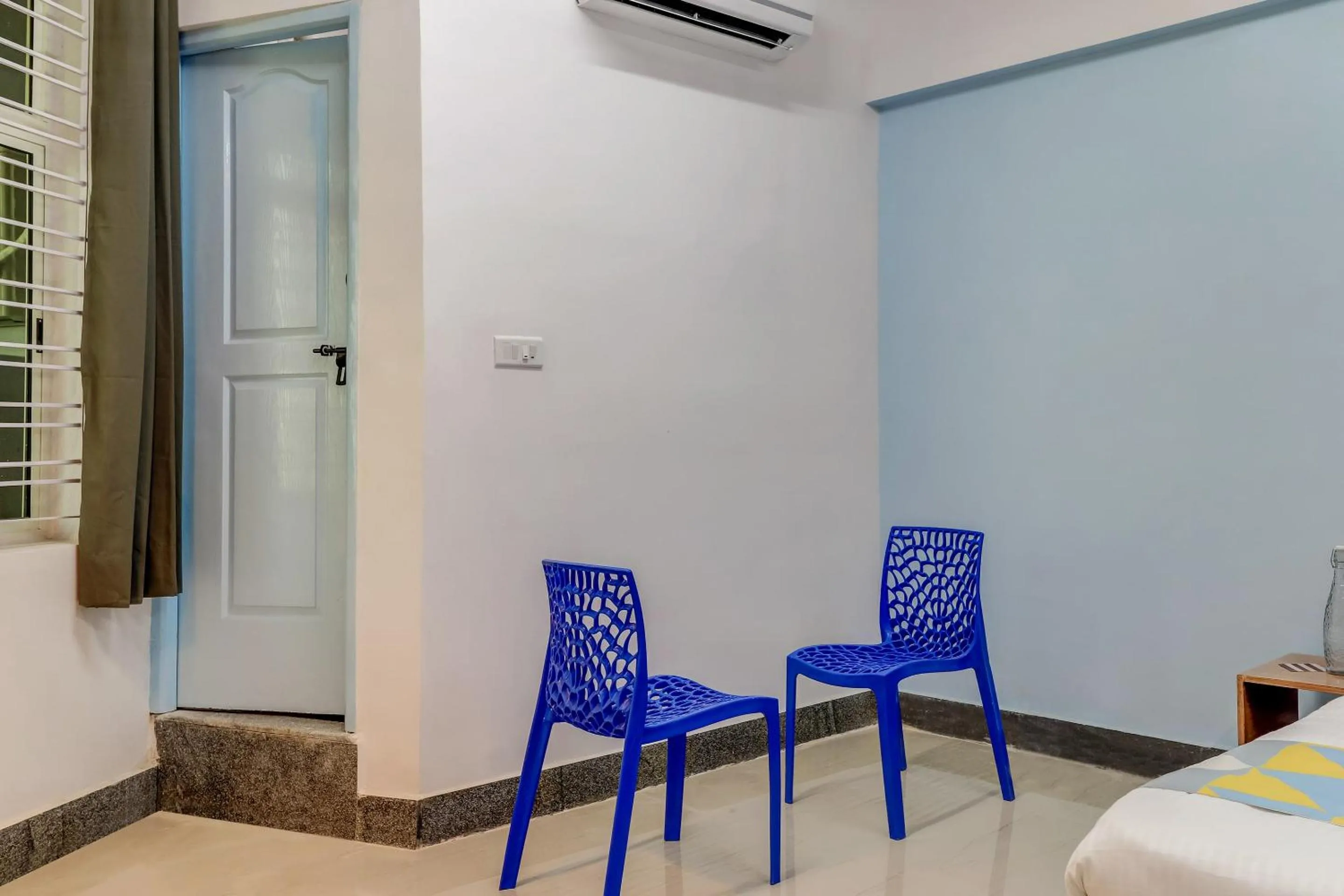 Lobby or reception in Capital O Elite Stay Jp Nagar Near SRI SATHYA GANAPATHI SHIRDI SAIBABA Temple