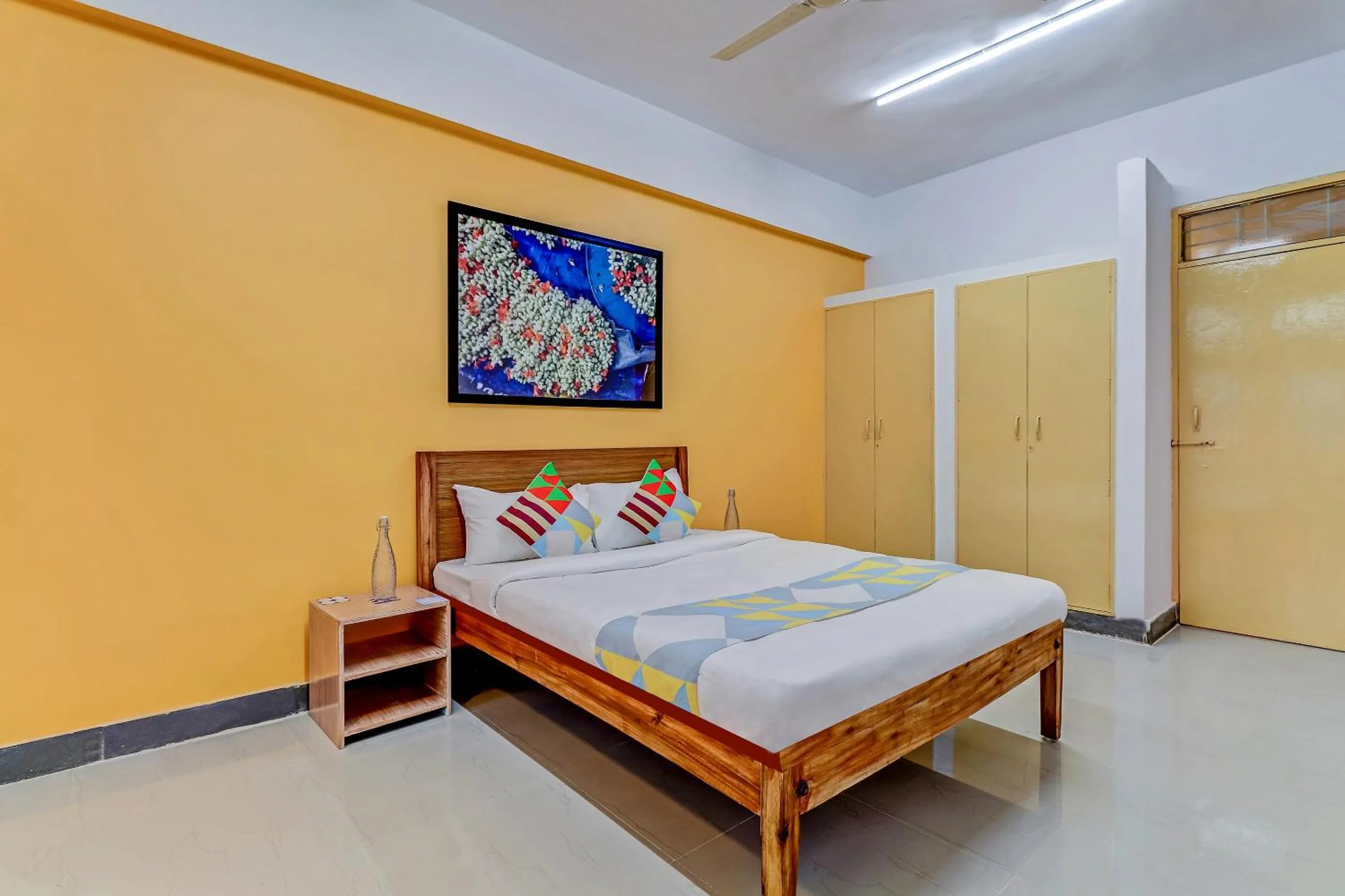 Bedroom, Bed in Capital O Elite Stay Jp Nagar Near SRI SATHYA GANAPATHI SHIRDI SAIBABA Temple