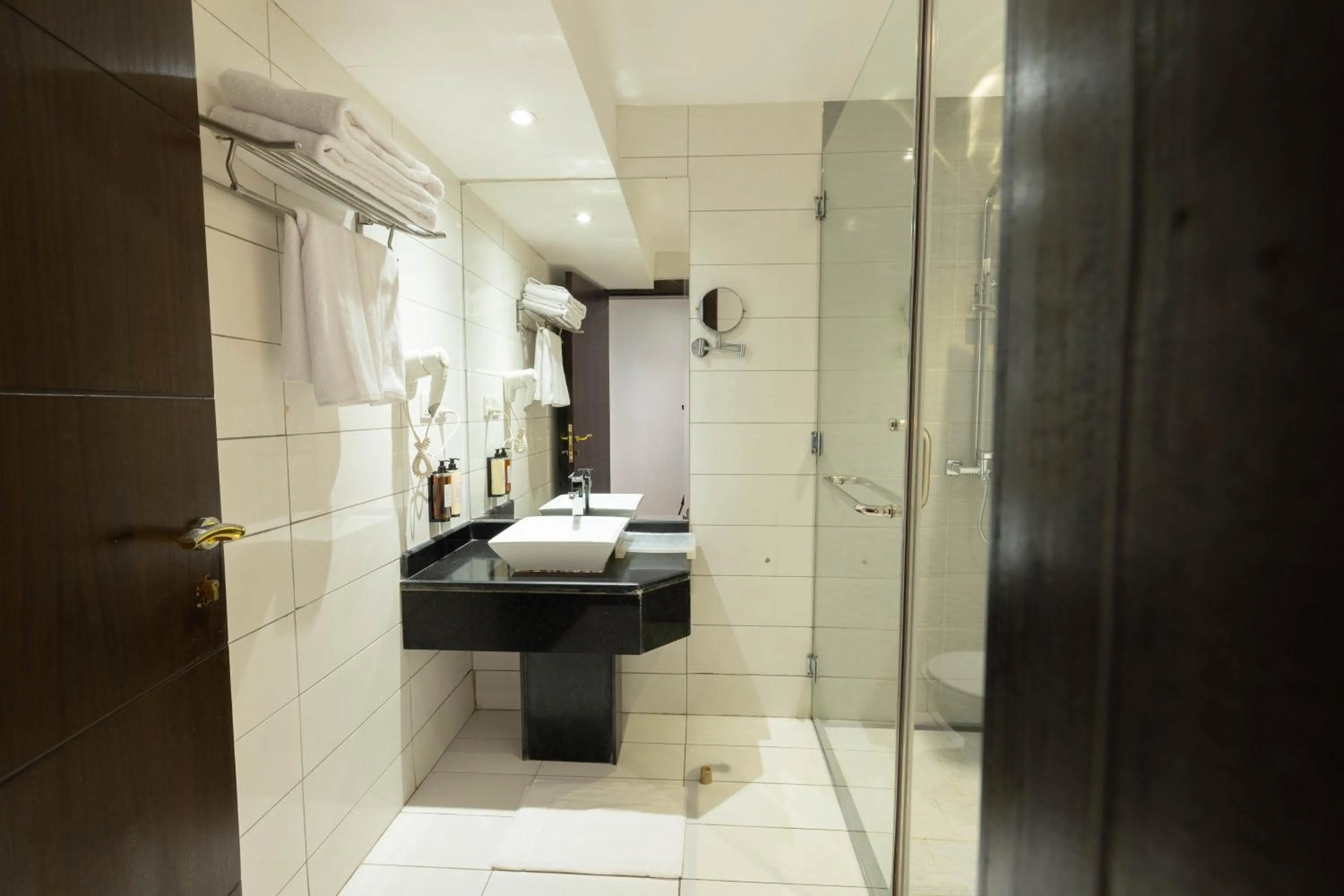 Bathroom in Mira Business Hotel