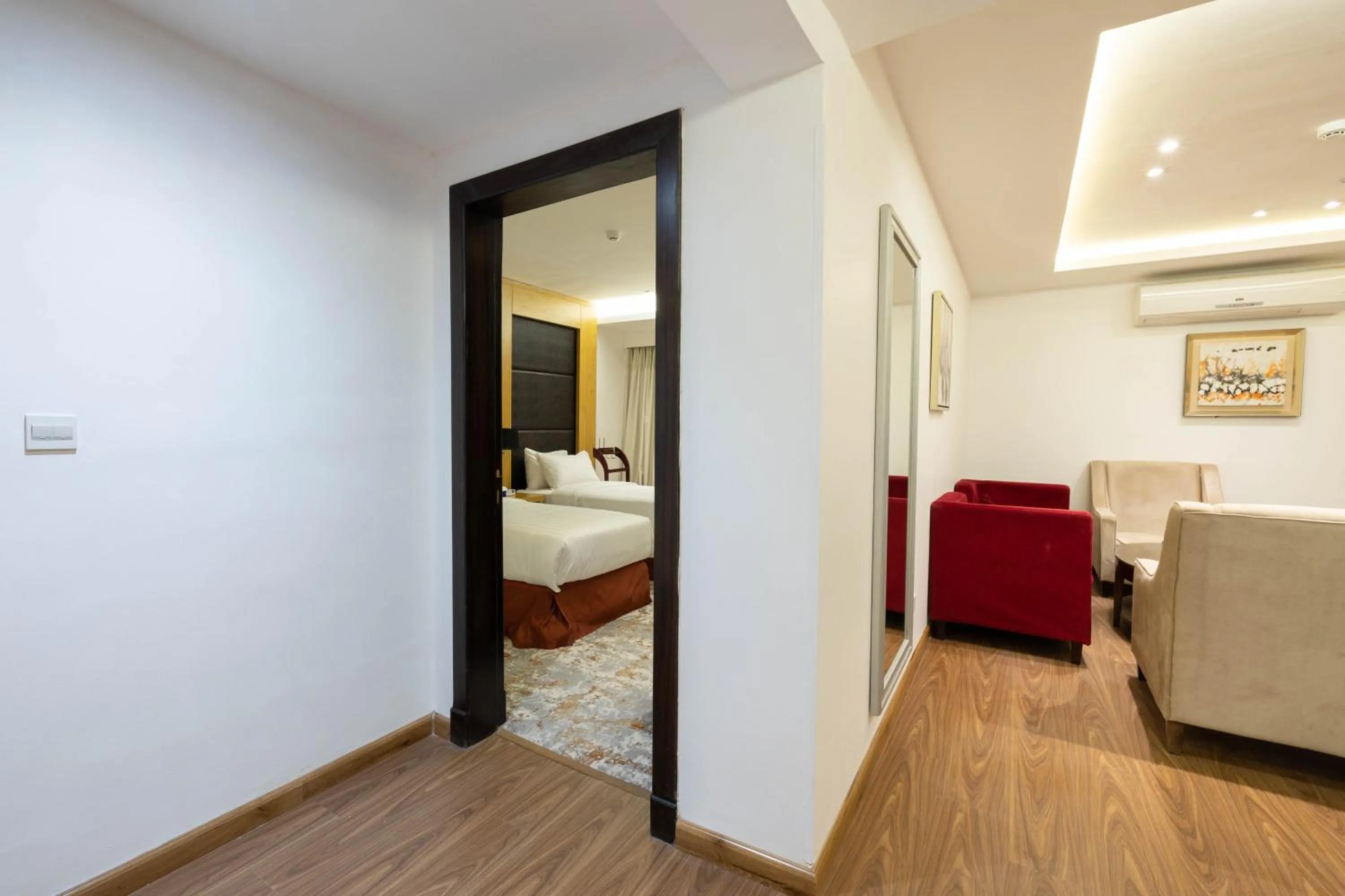 Living room, Bed in Mira Business Hotel